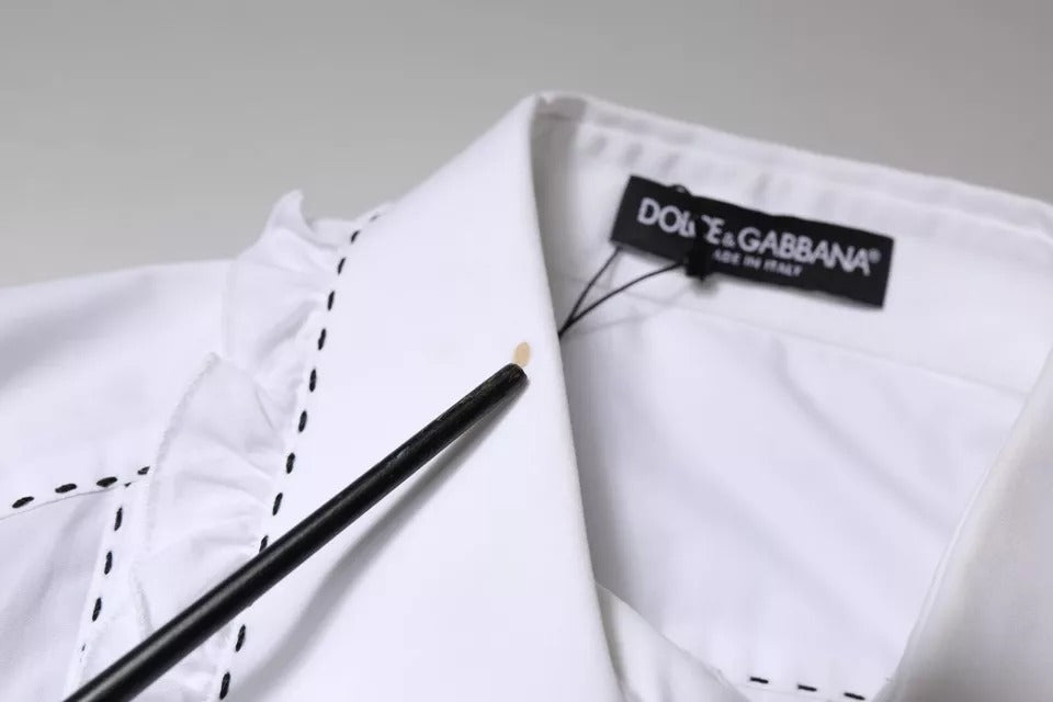Indulge in the exquisite Dolce & Gabbana White Cotton Long Sleeves Ruffle Collar Top, a timeless piece that embodies Italian craftsmanship and elevates your elegance.