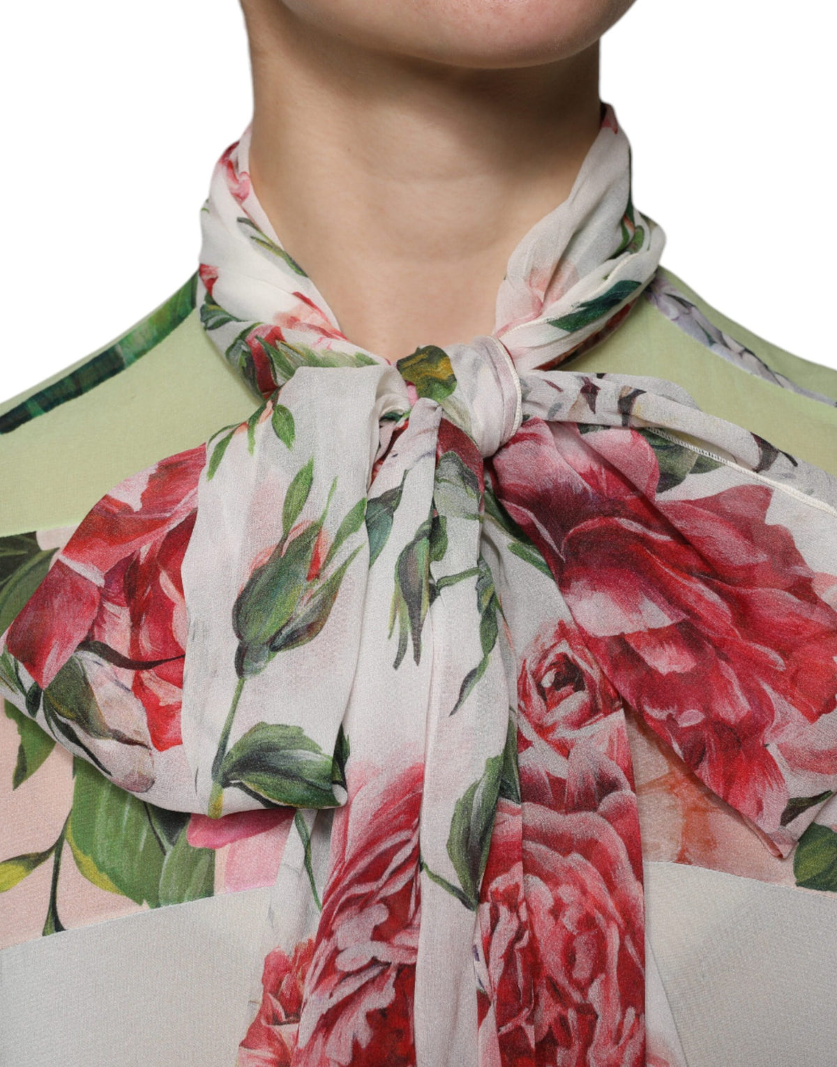 Elevate your style with the Dolce & Gabbana Multicolor Floral Patchwork Ascot Collar Top, a couture masterpiece crafted in Italy from premium silk and elastane, embodying timeless elegance and sophistication.