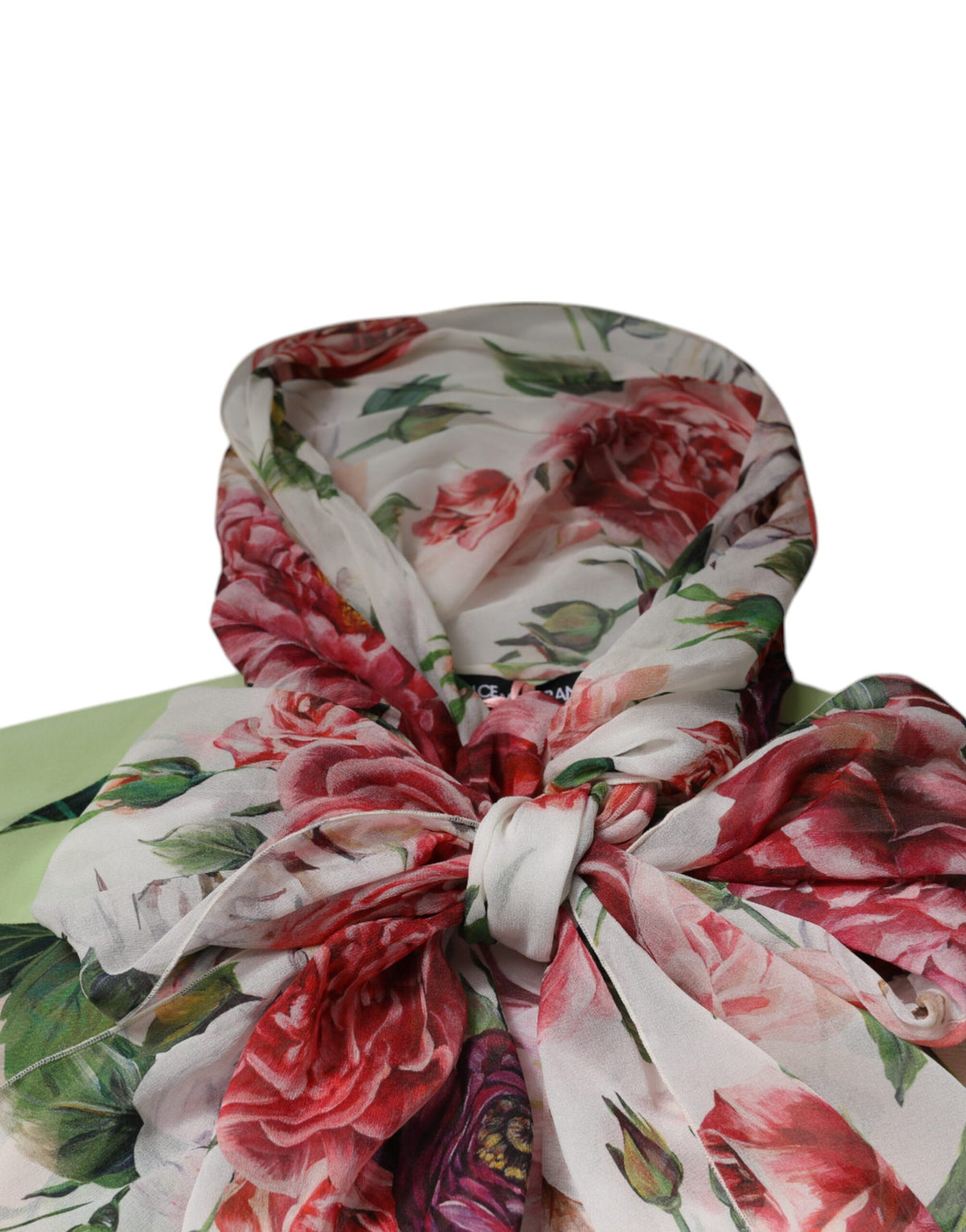 Elevate your wardrobe with the Dolce & Gabbana Multicolor Floral Patchwork Ascot Collar Top, a masterpiece of haute couture crafted in Italy from a luxurious silk blend, perfect for unforgettable moments.