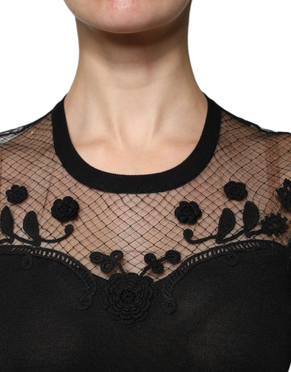 Indulge in the exquisite Dolce & Gabbana Black Floral Lace Short Sleeves Blouse Top, a masterpiece of silk and lace that embodies timeless elegance and sophisticated allure.