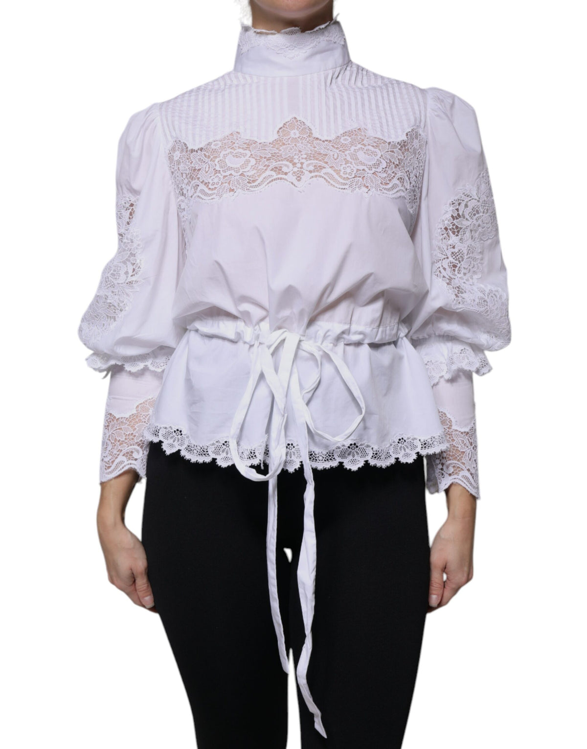 Elevate your wardrobe with the Dolce & Gabbana White Cotton Lace Trim Turtleneck Blouse, a masterpiece of Italian craftsmanship that embodies timeless elegance and sensual allure.