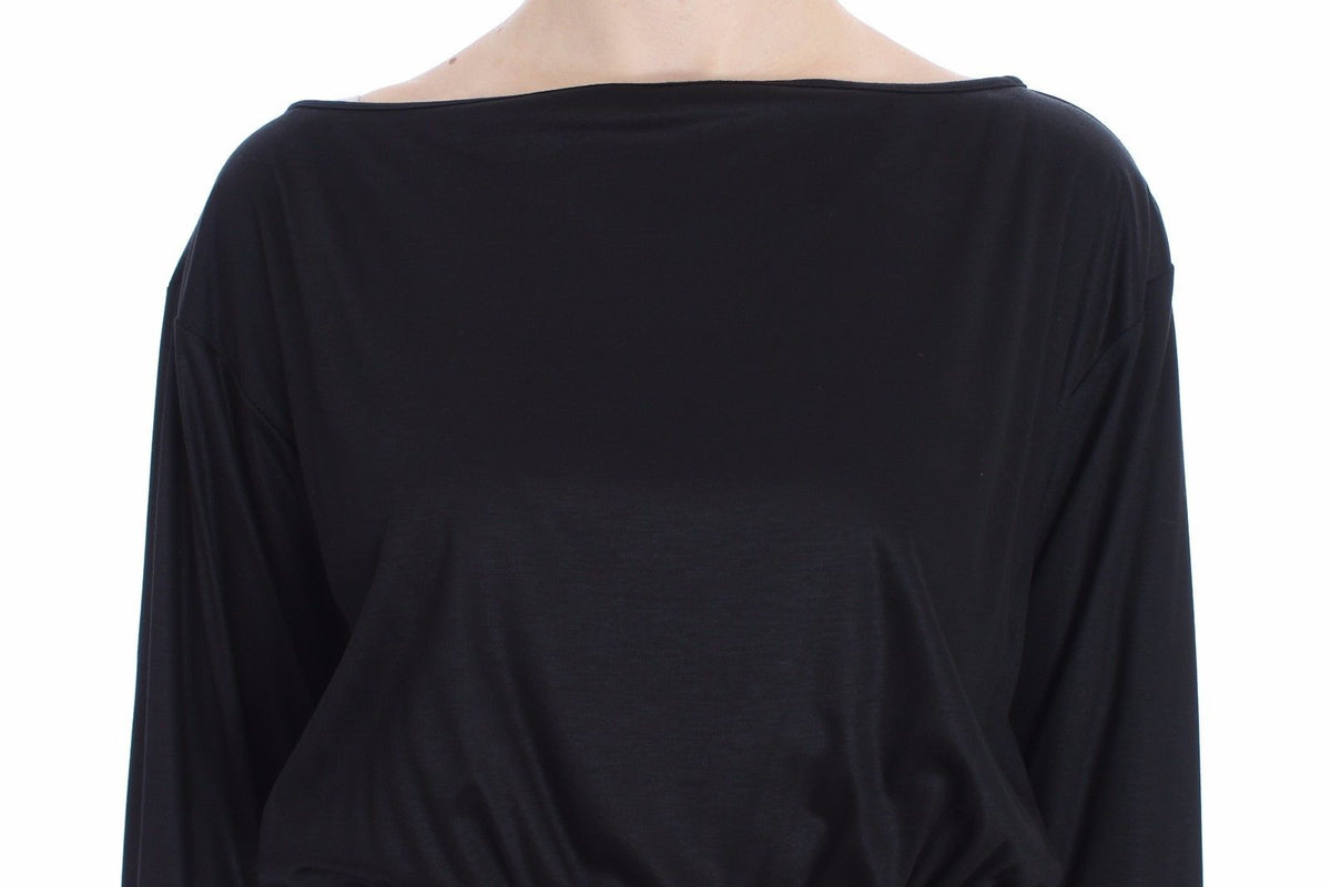 Indulge in the exquisite Versace Jeans Black Modal Silk Shift Knee Dress, where sumptuous modal and silk meet Italian craftsmanship, embodying timeless elegance and sophisticated allure.