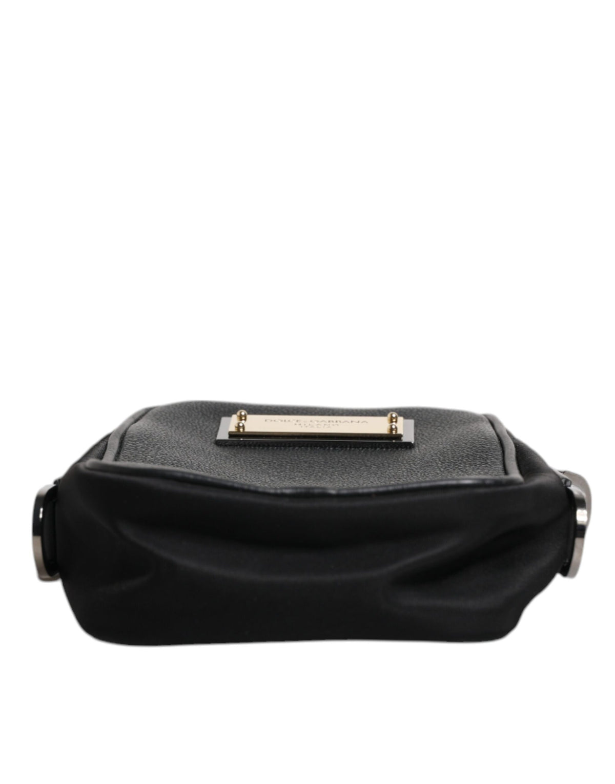 Elevate your elegance with the Dolce & Gabbana Black Grain Leather Logo Plaque Clutch, a timeless masterpiece that embodies luxurious craftsmanship and sophistication.