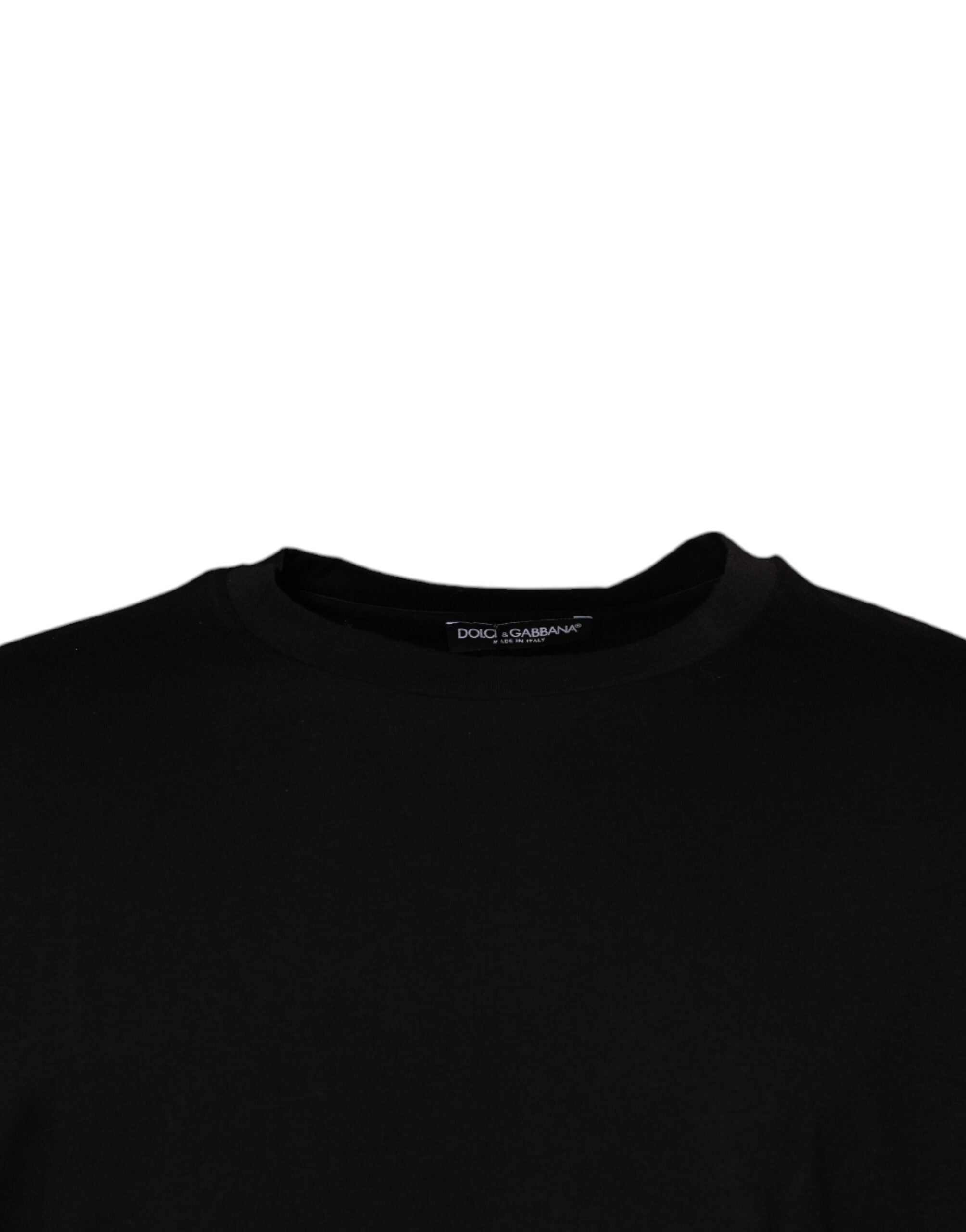 Elevate your wardrobe with the Dolce & Gabbana Black Crew Neck Short Sleeve T-shirt, a timeless piece crafted from luxurious 100% cotton, embodying sophistication and elegance.
