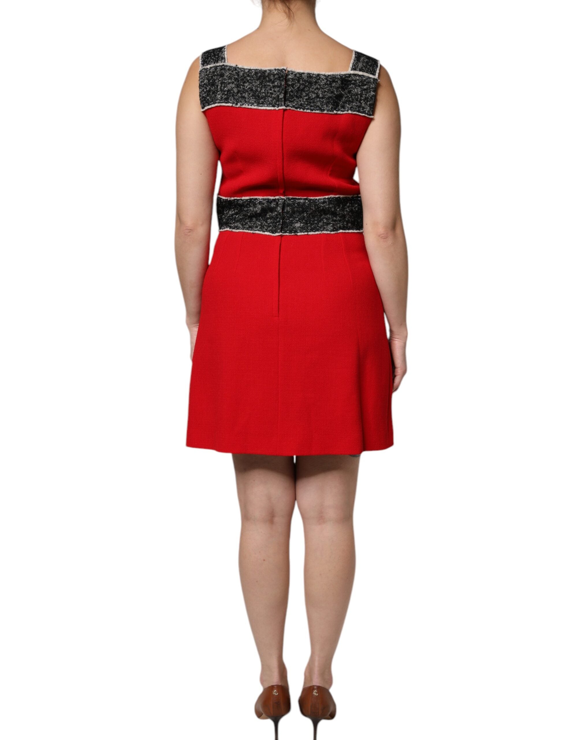 Indulge in the exquisite Dolce & Gabbana Red Wool Sleeveless A-line Flared Mini Dress, a masterpiece of Italian craftsmanship that redefines luxury and elegance for every occasion.