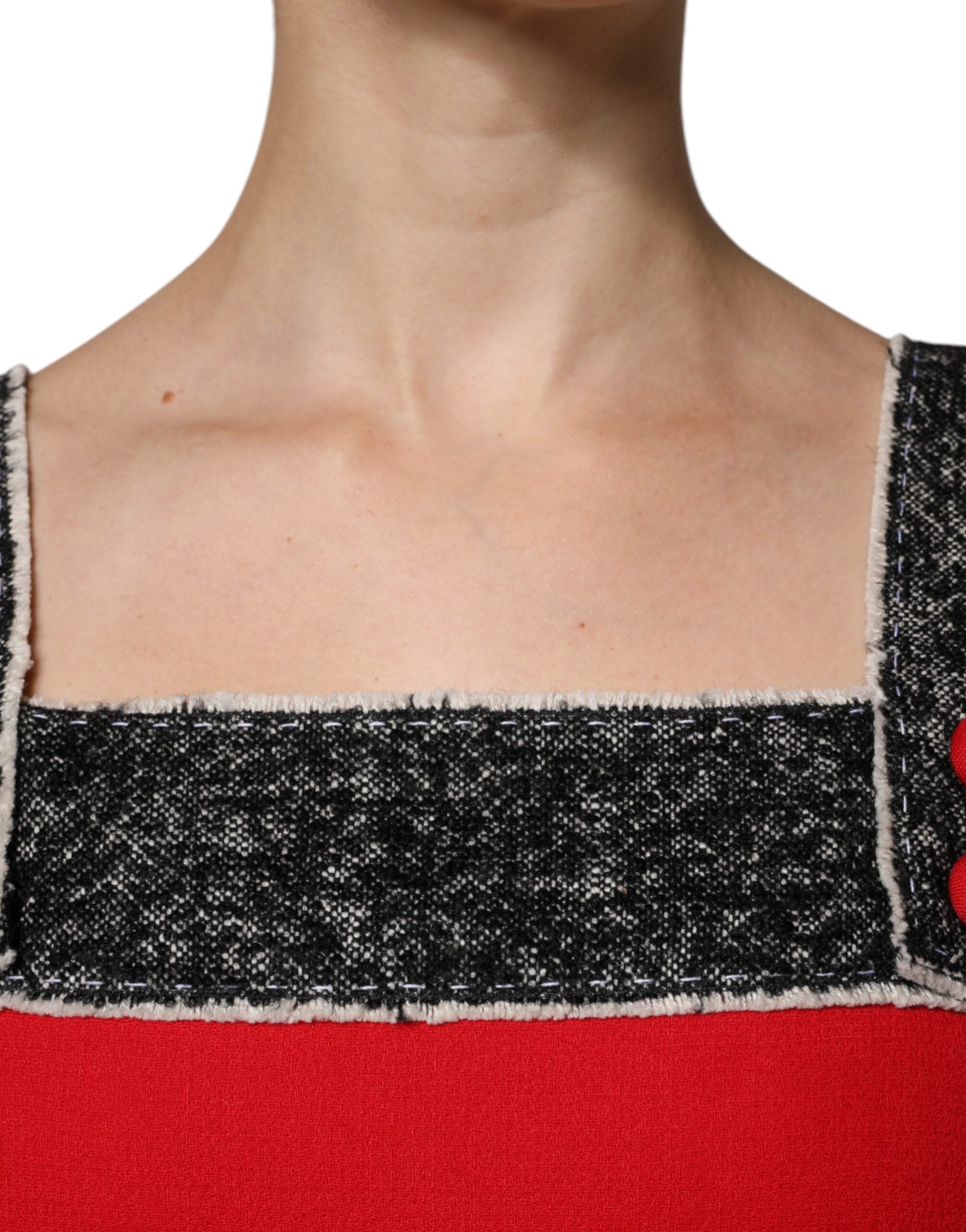 Indulge in the exquisite Dolce & Gabbana Red Wool Sleeveless A-line Flared Mini Dress, a masterpiece of Italian craftsmanship, perfect for elevating your sophisticated style.
