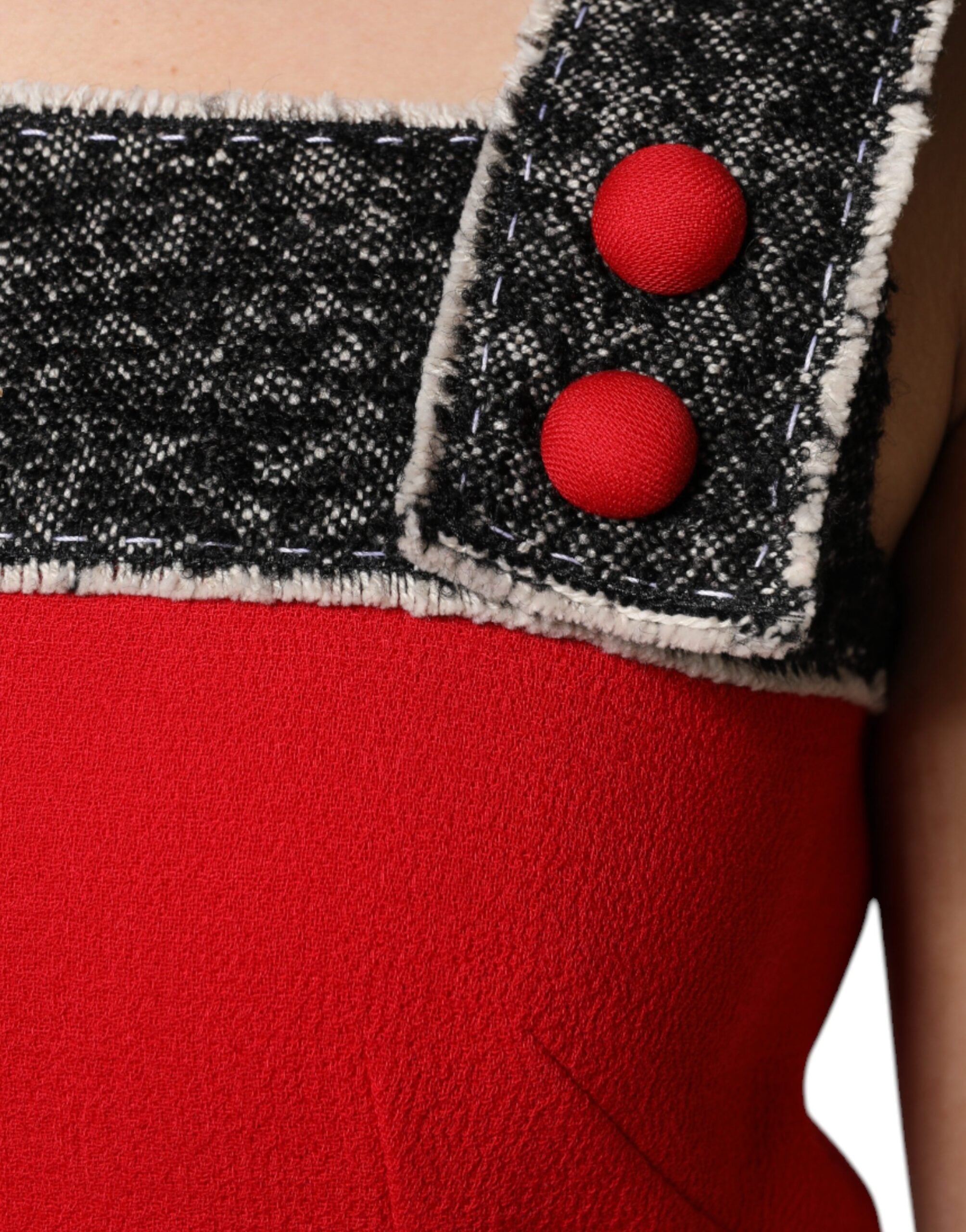 Indulge in the exquisite Dolce & Gabbana Red Wool Sleeveless A-line Flared Mini Dress, a masterpiece of Italian craftsmanship that redefines elegance and allure for every occasion.