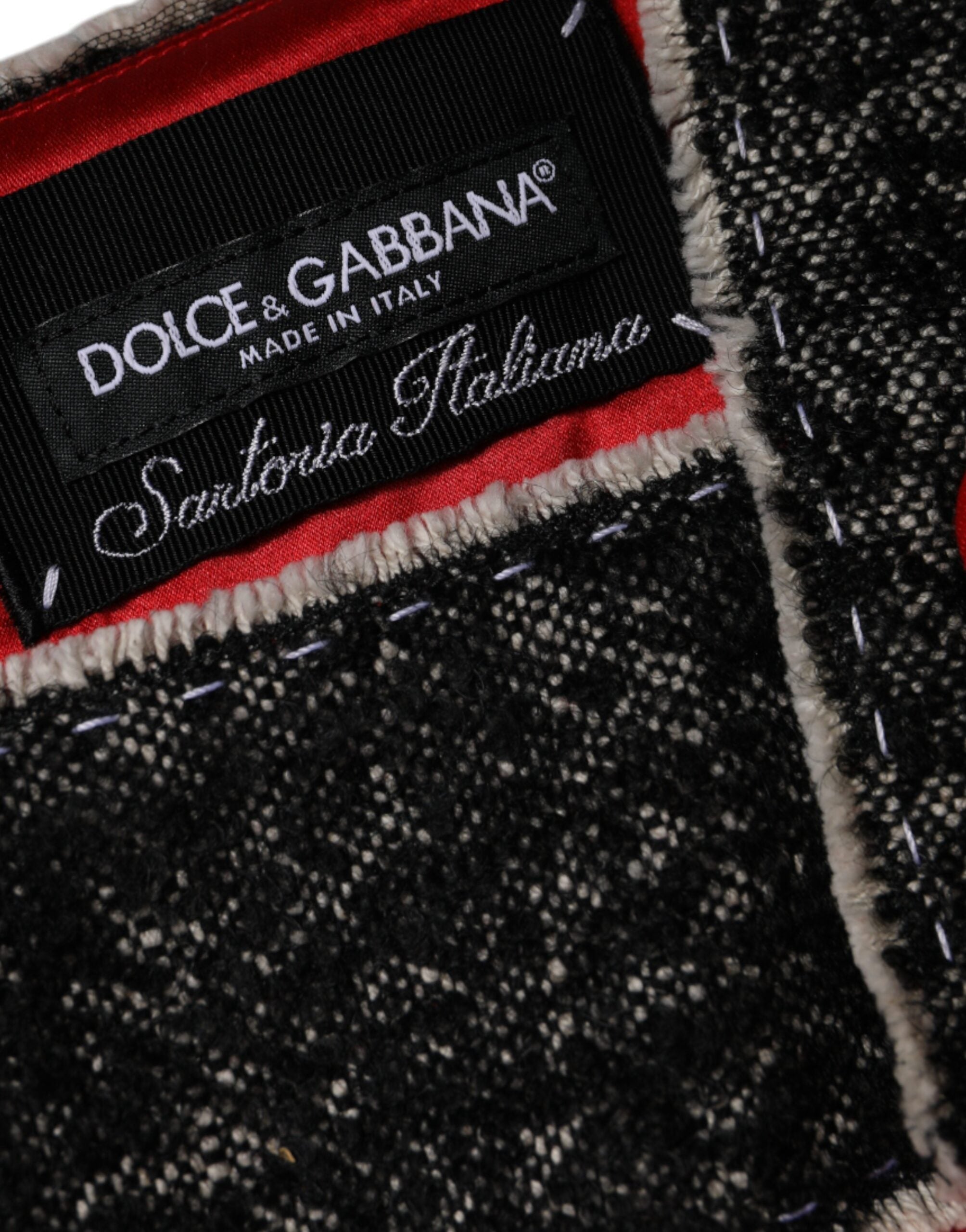 Indulge in the exquisite allure of the Dolce & Gabbana Red Wool Sleeveless A-line Flared Mini Dress, a testament to Italian craftsmanship and timeless elegance.