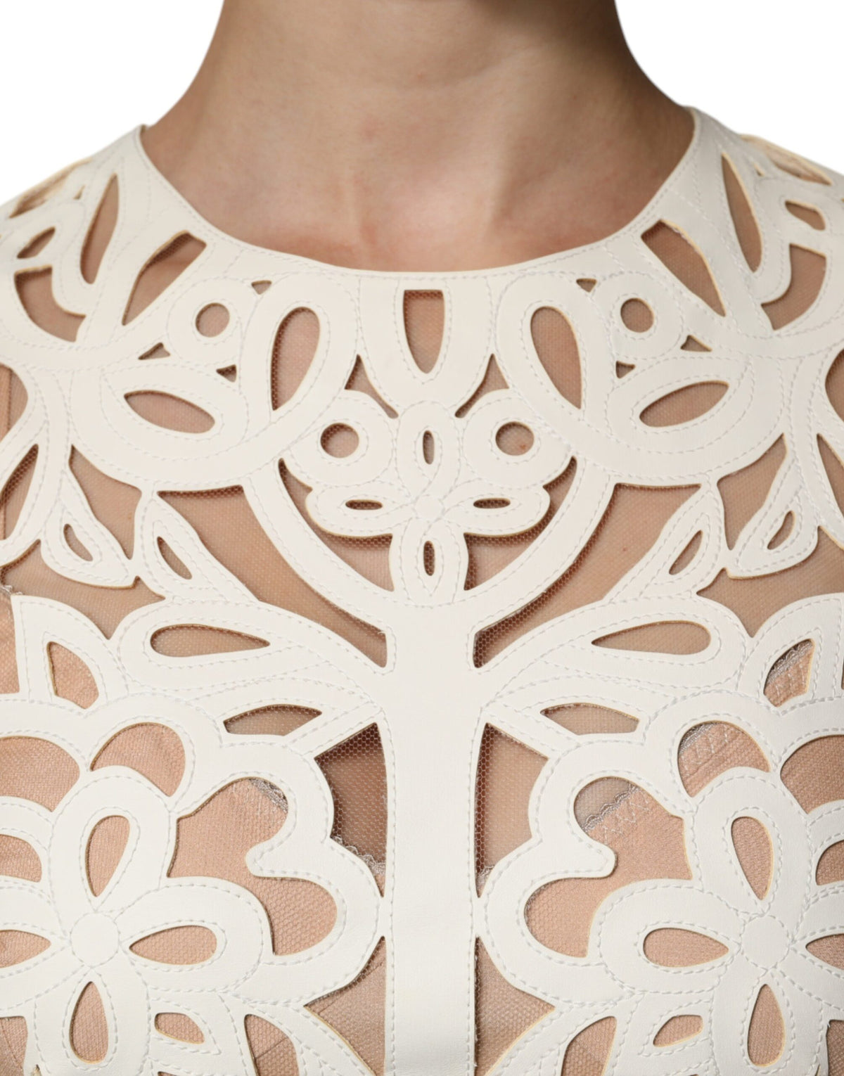 Elevate your wardrobe with the Dolce & Gabbana White Cut Out Leather Sleeveless Midi Dress, a masterpiece of artisanal craftsmanship in luxurious lamb leather, designed for the discerning individual.