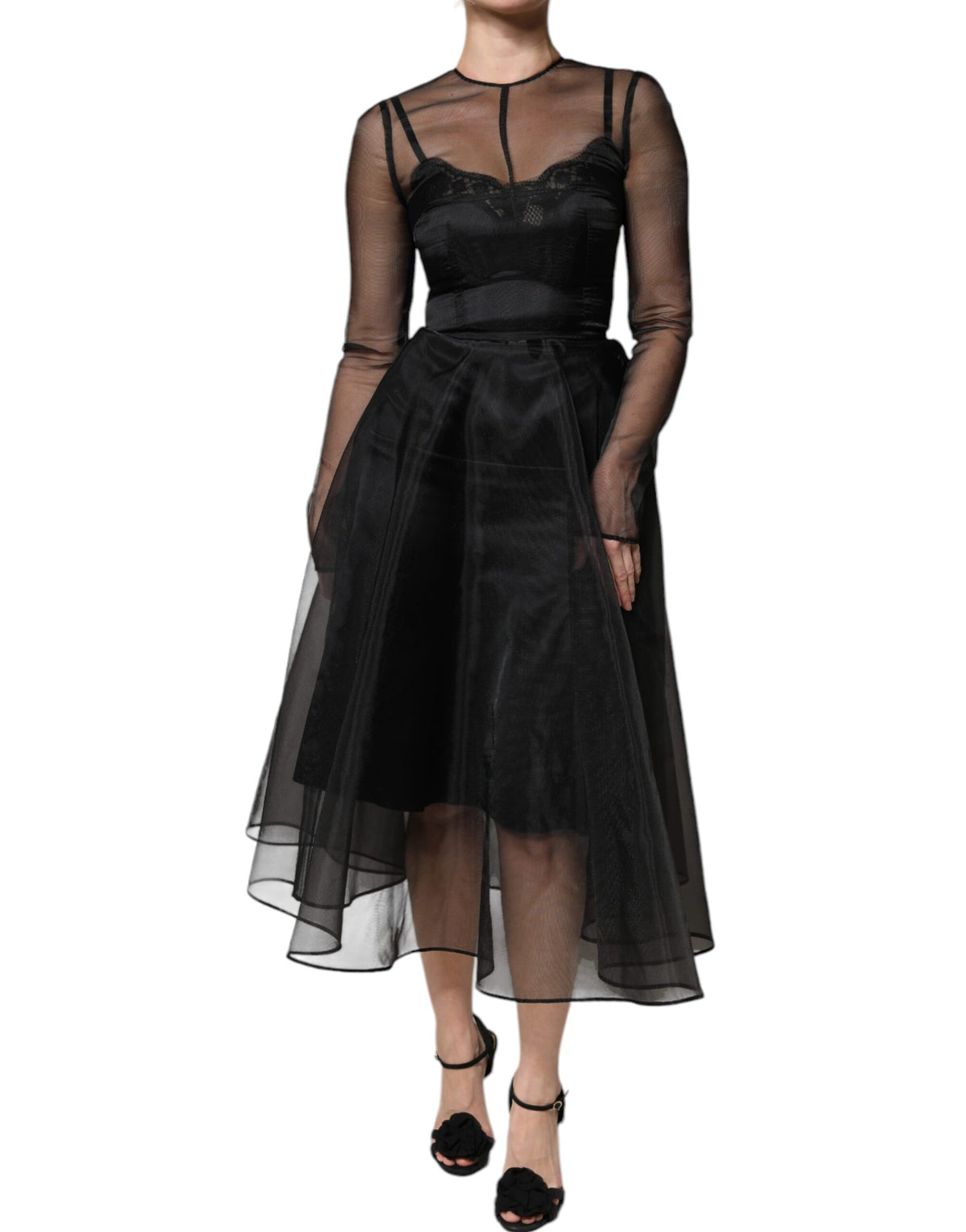 Indulge in the exquisite Dolce & Gabbana Black Tulle A-line Midi Cocktail Gown, a masterpiece of Italian craftsmanship that embodies elegance and allure for unforgettable moments.