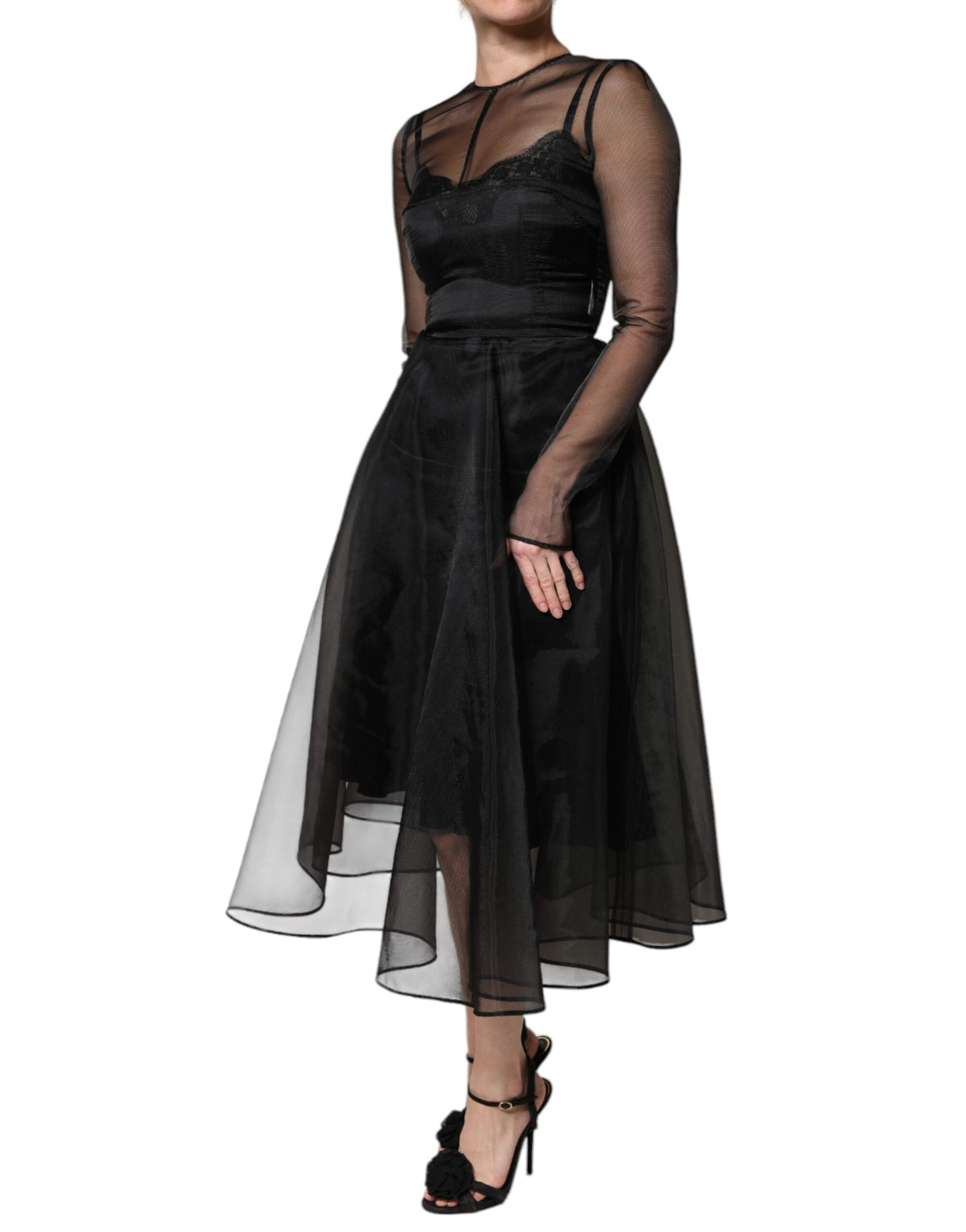 Indulge in the exquisite Dolce & Gabbana Black Tulle A-line Midi Cocktail Gown, a masterpiece of Italian craftsmanship that embodies elegance and allure for any refined occasion.