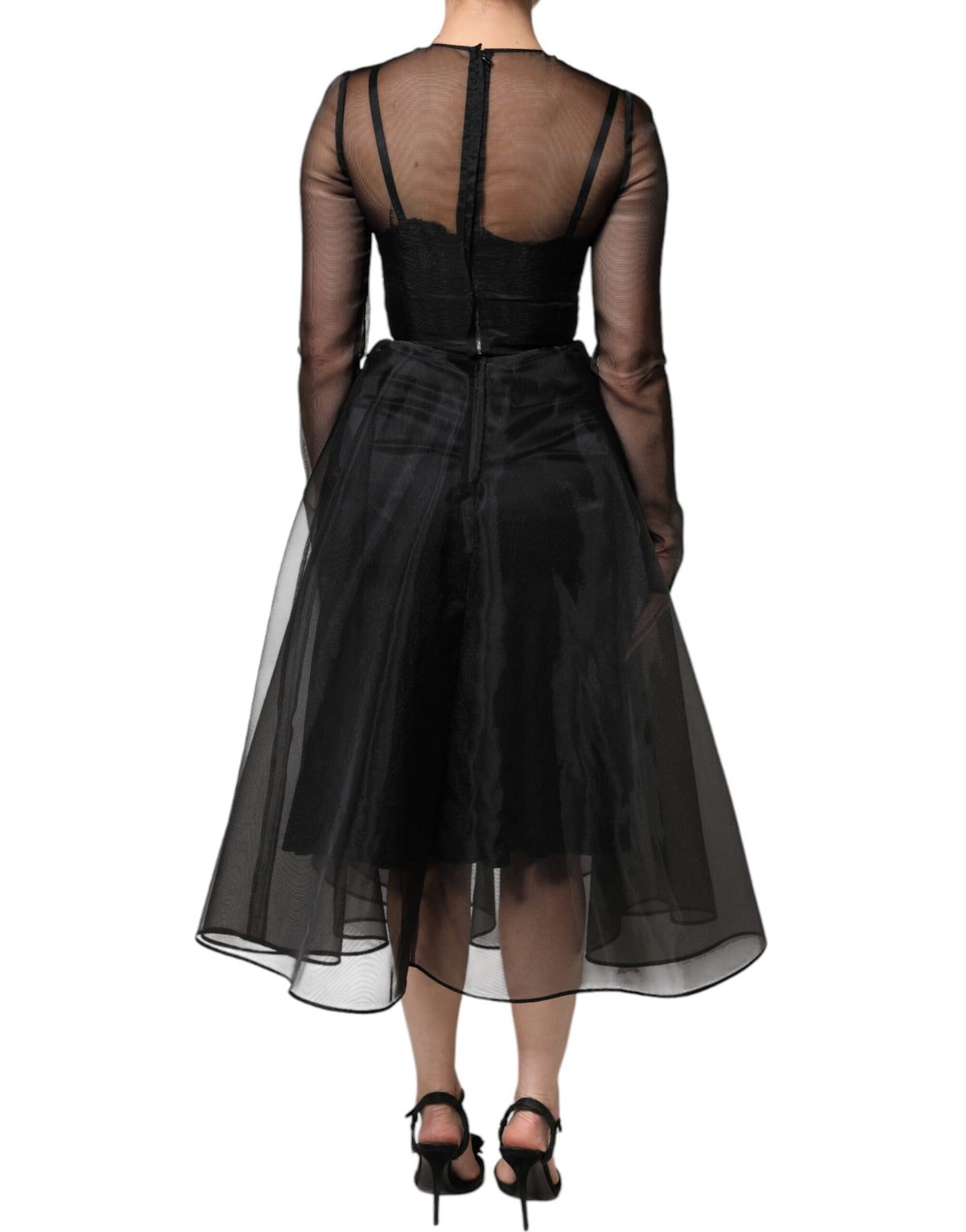 Indulge in the exquisite allure of Dolce & Gabbana's Black Tulle A-line Midi Cocktail Gown, crafted in Italy from luxurious tulle for an unforgettable presence at any occasion.
