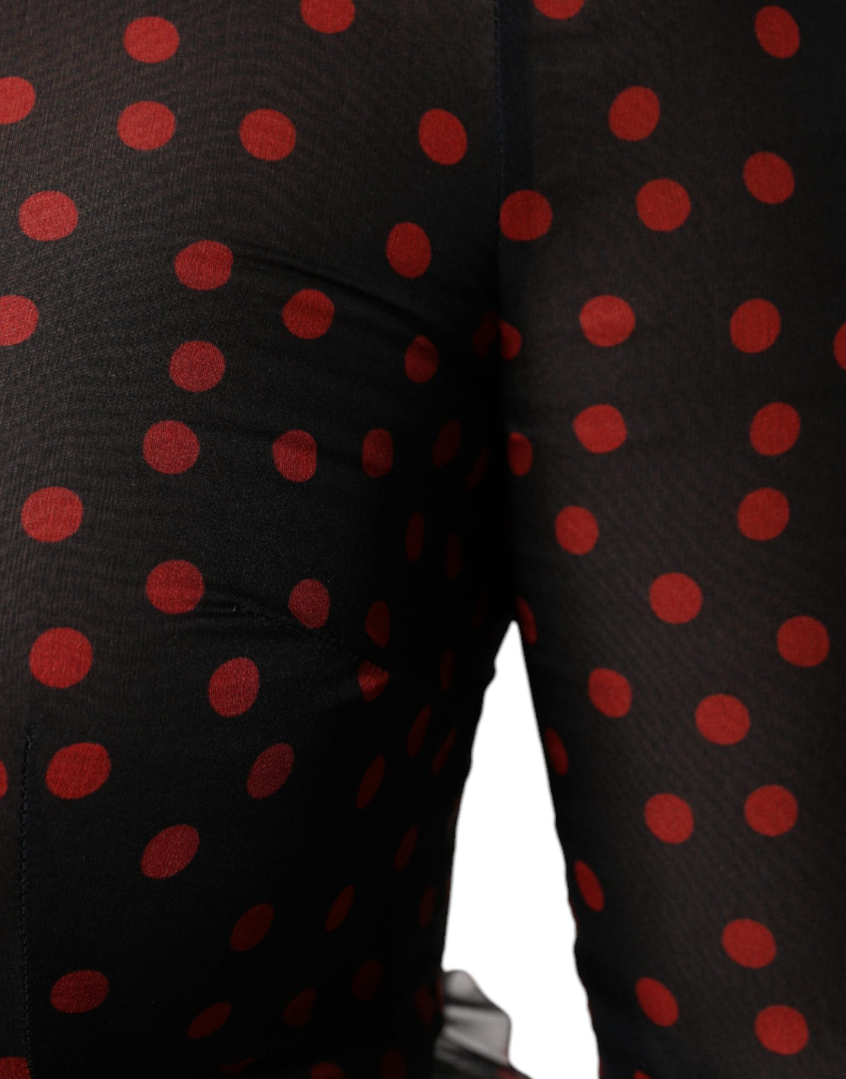 Experience the allure of the Dolce & Gabbana Black Red Polka Dot Silk Layered Midi Dress, a masterpiece of Italian craftsmanship that embodies timeless elegance and sophistication.