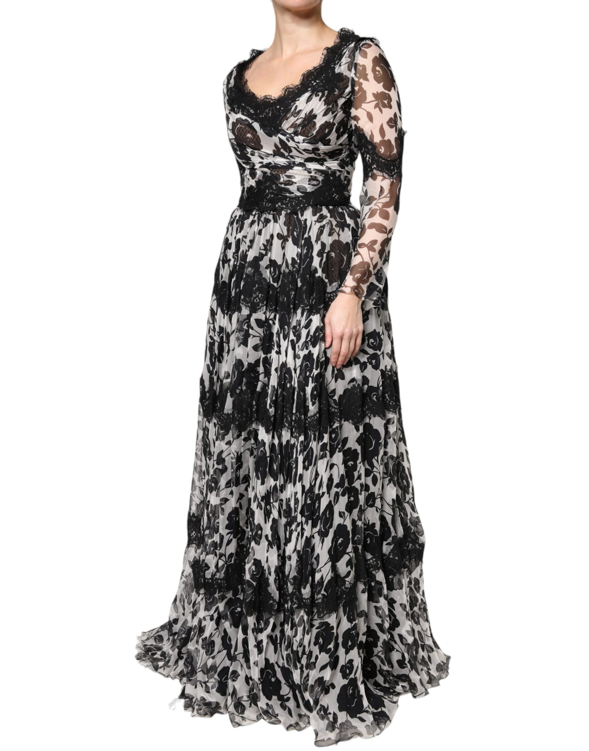 Elevate your wardrobe with the Dolce & Gabbana Black Silk Floral Lace Ricamo Ball Maxi Dress, a timeless masterpiece of Italian craftsmanship that embodies elegance and allure.