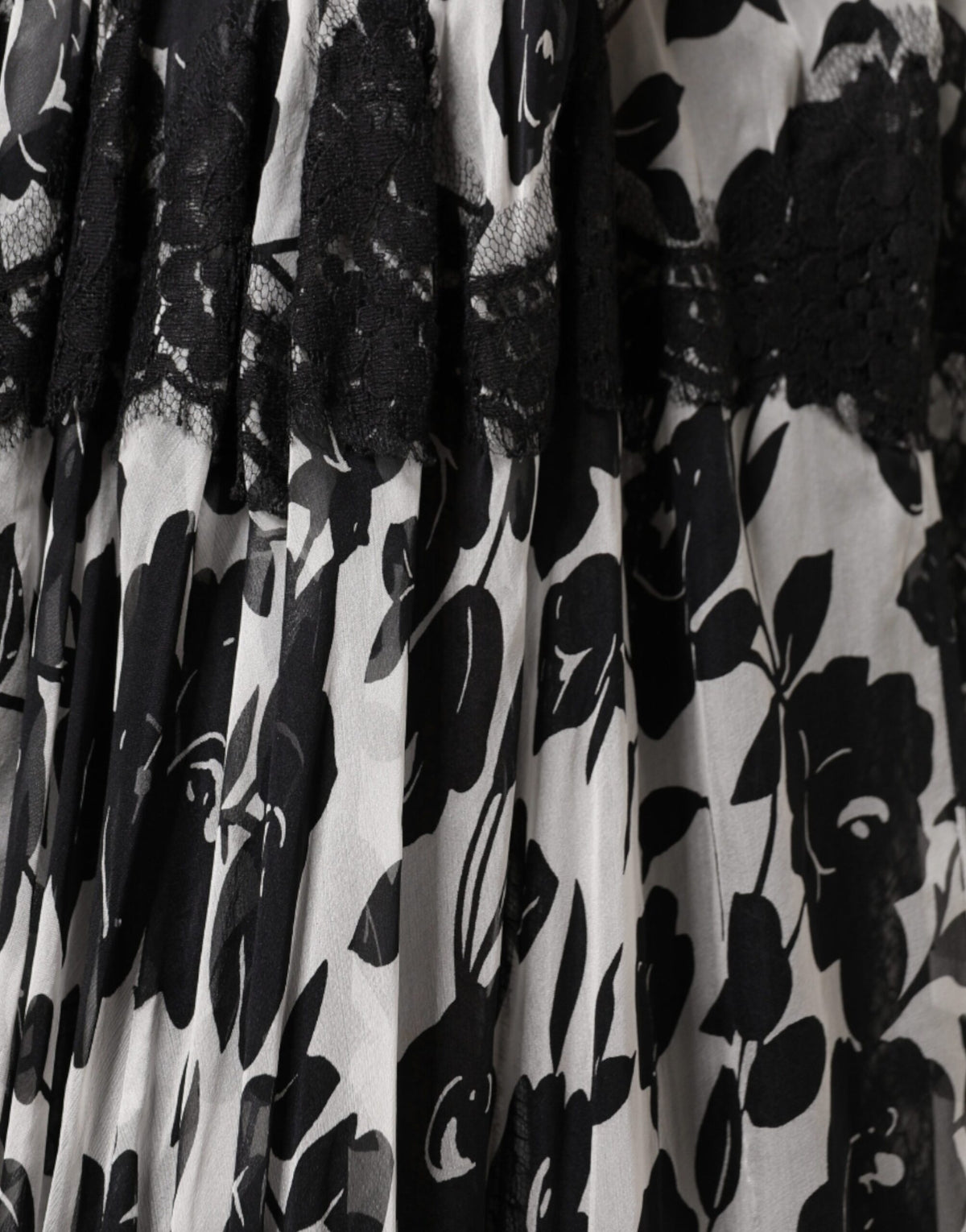 Indulge in the exquisite allure of the Dolce & Gabbana Black Silk Floral Lace Ricamo Ball Maxi Dress, where Italian craftsmanship meets timeless elegance for the discerning connoisseur.