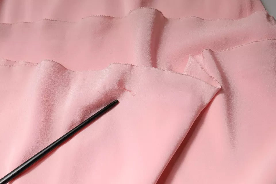 Indulge in the Ermanno Scervino Pink Floral Lace Midi Dress, a silk masterpiece that embodies Italian craftsmanship, elevating your allure for every exquisite occasion.
