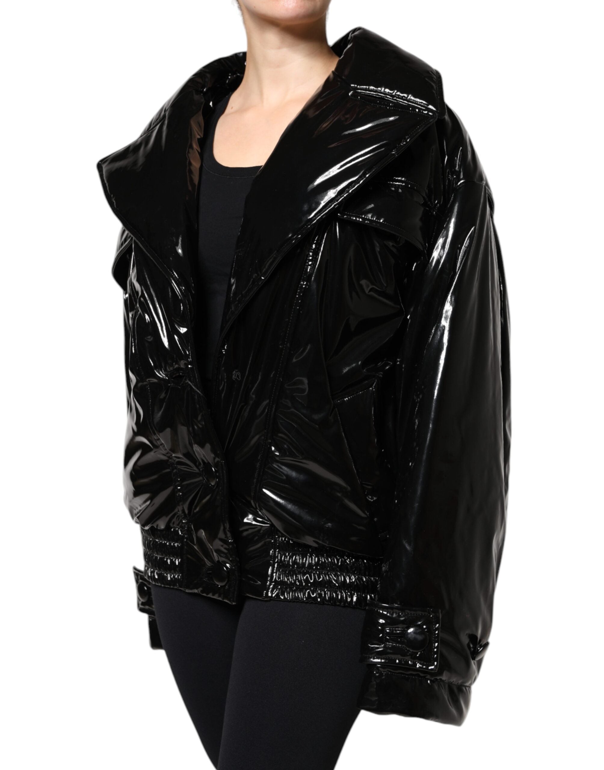 Indulge in the exquisite Dolce & Gabbana Black Polyester Button Down Blouson Jacket, a timeless piece crafted in Italy, blending luxury with effortless elegance for the discerning individual.