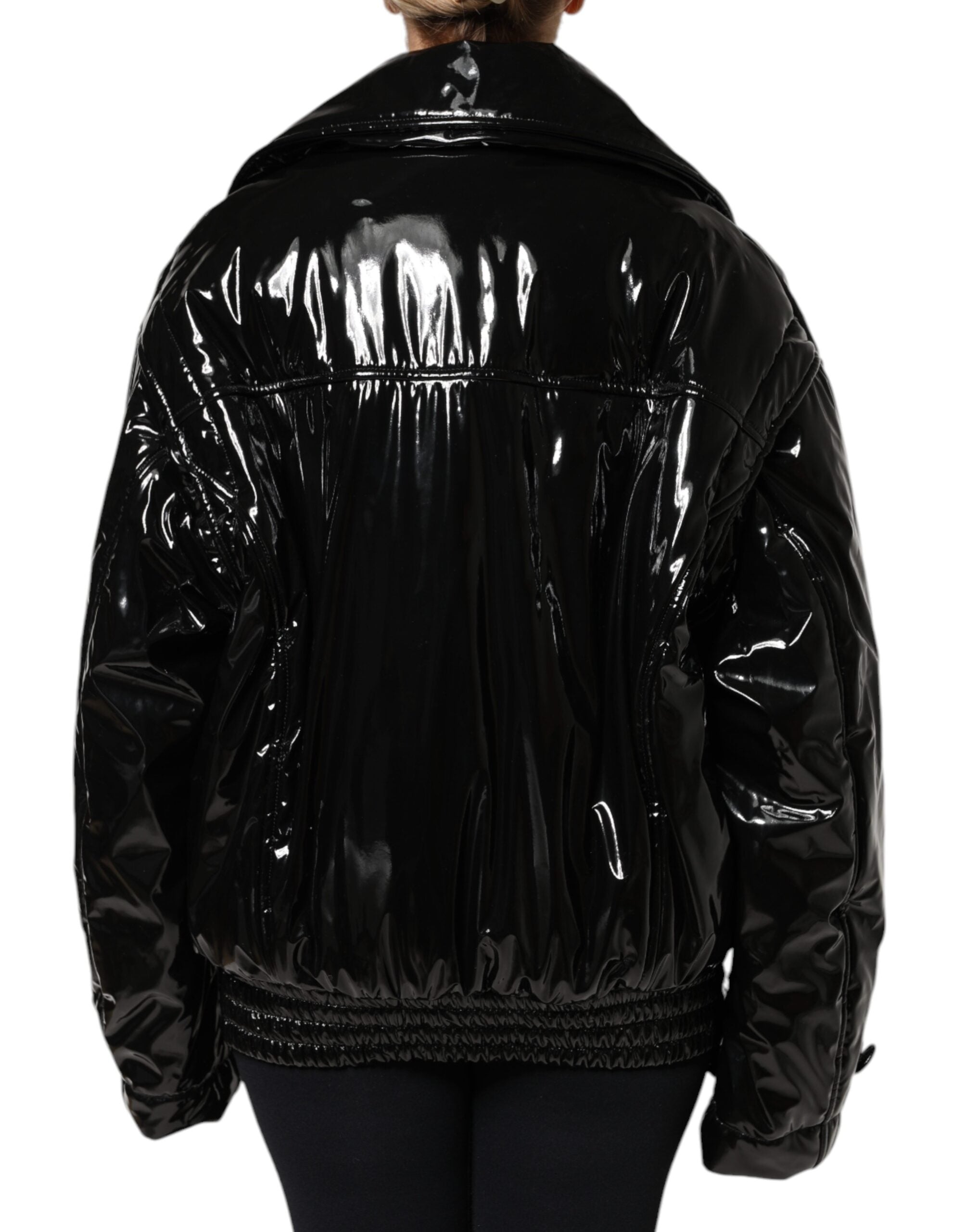 Elevate your wardrobe with the Dolce & Gabbana Black Polyester Button Down Blouson Jacket, a masterpiece of Italian craftsmanship that embodies timeless luxury and sophisticated allure.
