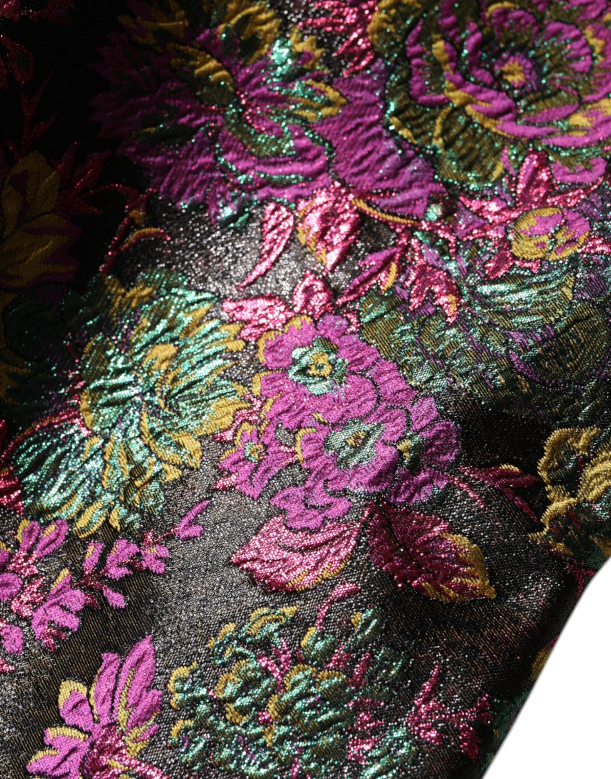 Indulge in the exquisite allure of the Dolce & Gabbana Multicolor Floral Jacquard Cropped Jacket, where luxurious silk and polyester blend in a masterpiece of Italian craftsmanship.