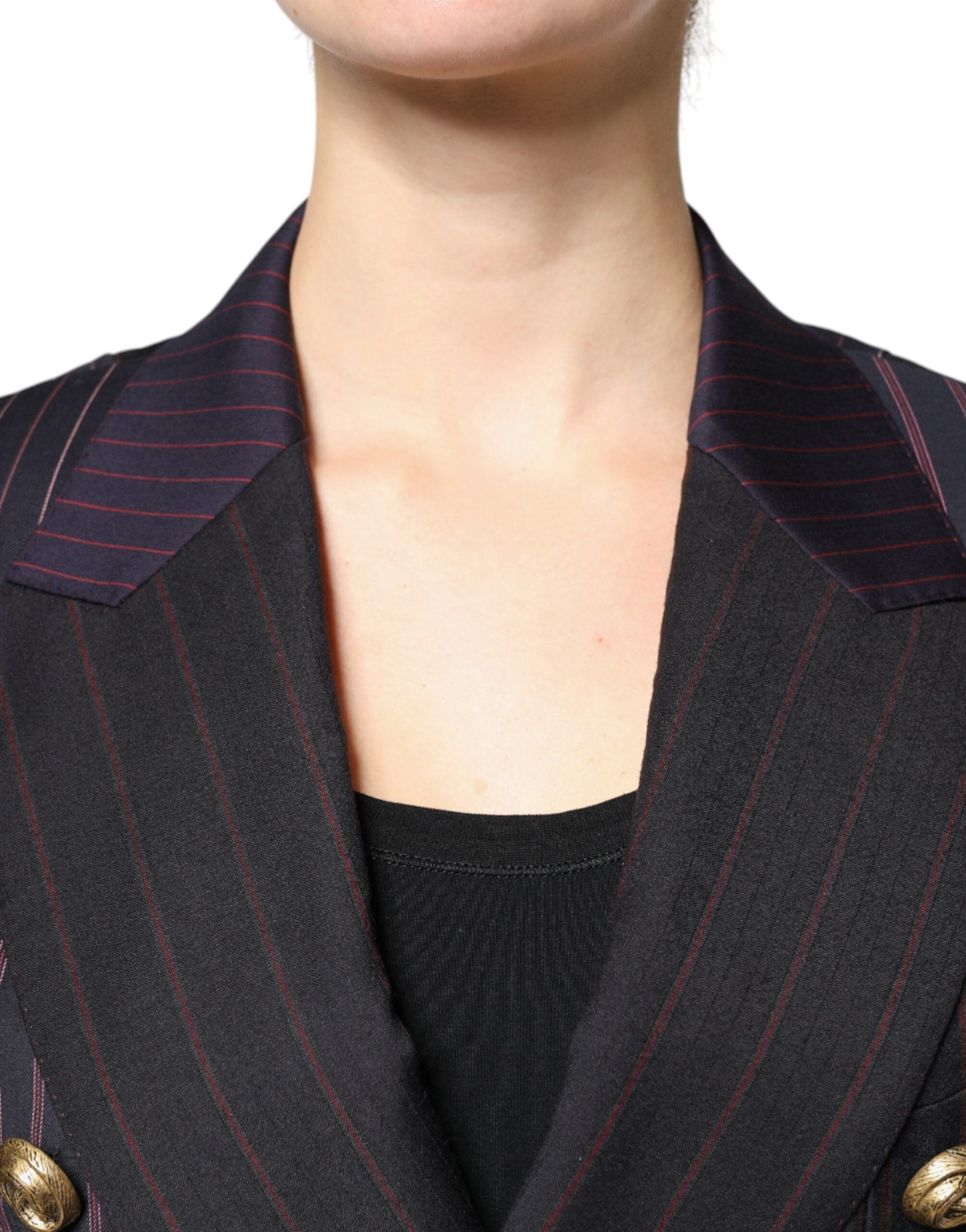 Elevate your wardrobe with the Dolce & Gabbana Multicolor Stripes Wool Cropped Blazer, a masterpiece of Italian craftsmanship that embodies luxury and sophistication.