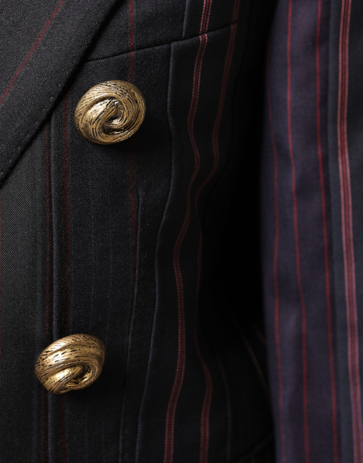 Elevate your wardrobe with the Dolce & Gabbana Multicolor Stripes Wool Cropped Blazer, a masterpiece of Italian craftsmanship in luxurious wool and silk, designed for the discerning individual.