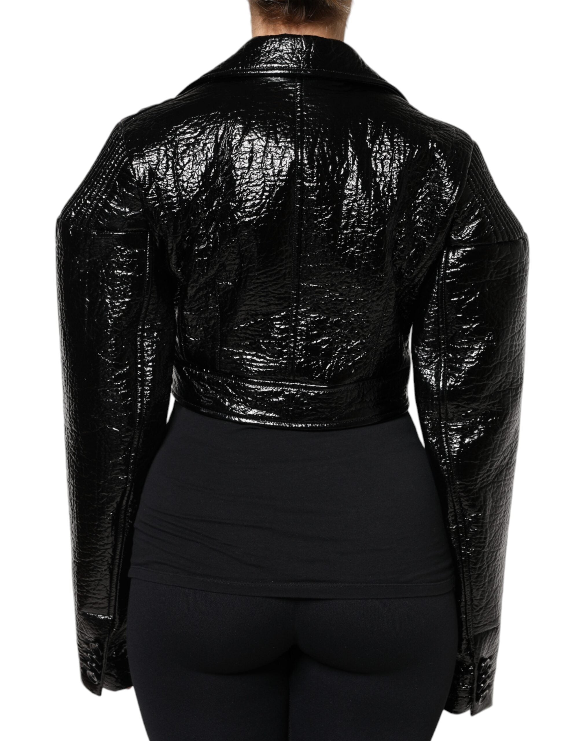 Elevate your wardrobe with the Dolce & Gabbana Black Leather Cropped Long Sleeve Coat Jacket, a timeless piece of exquisite craftsmanship that embodies elegance and sophistication.