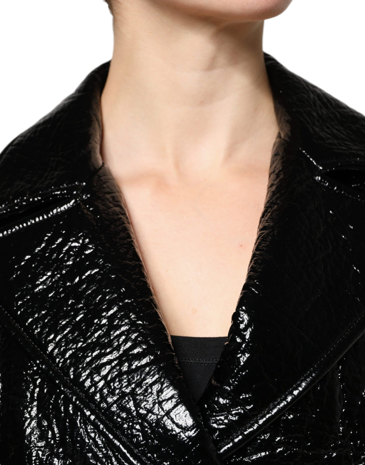 Elevate your wardrobe with the Dolce & Gabbana Black Leather Cropped Long Sleeve Coat Jacket, a masterpiece of Italian craftsmanship that embodies timeless elegance and sophistication.
