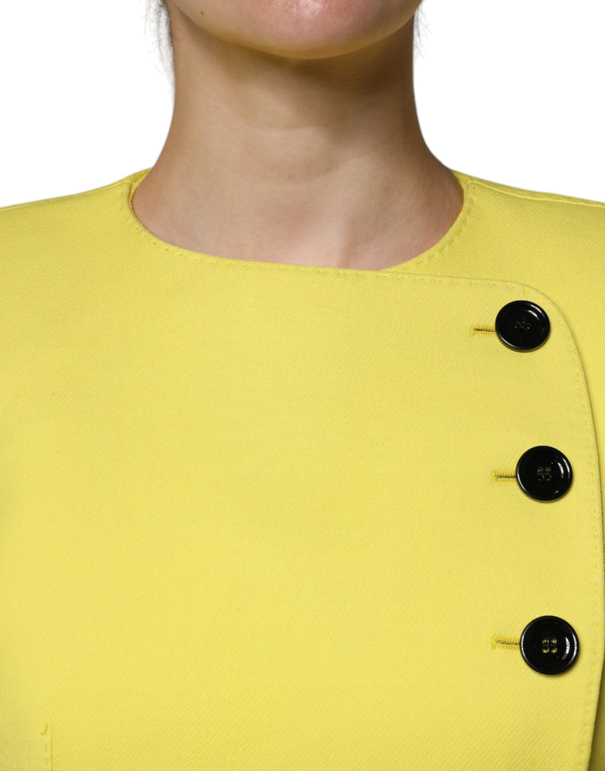 Elevate your wardrobe with the Dolce & Gabbana Lemon Yellow Wool Long Sleeves Cropped Coat Jacket, a luxurious blend of exquisite craftsmanship and timeless elegance.