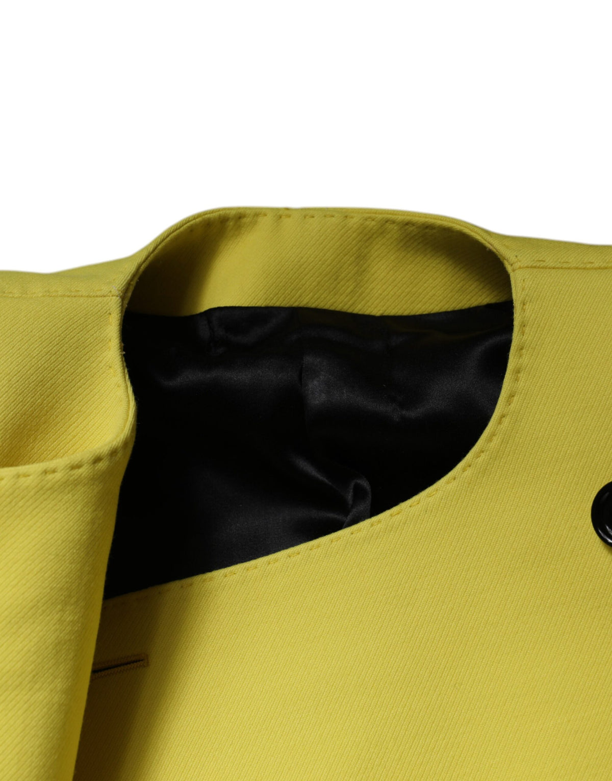 Indulge in the exquisite Dolce & Gabbana Lemon Yellow Wool Long Sleeves Cropped Coat Jacket, a luxurious statement piece crafted from 100% Virgin Wool, embodying Italian elegance and sophistication.