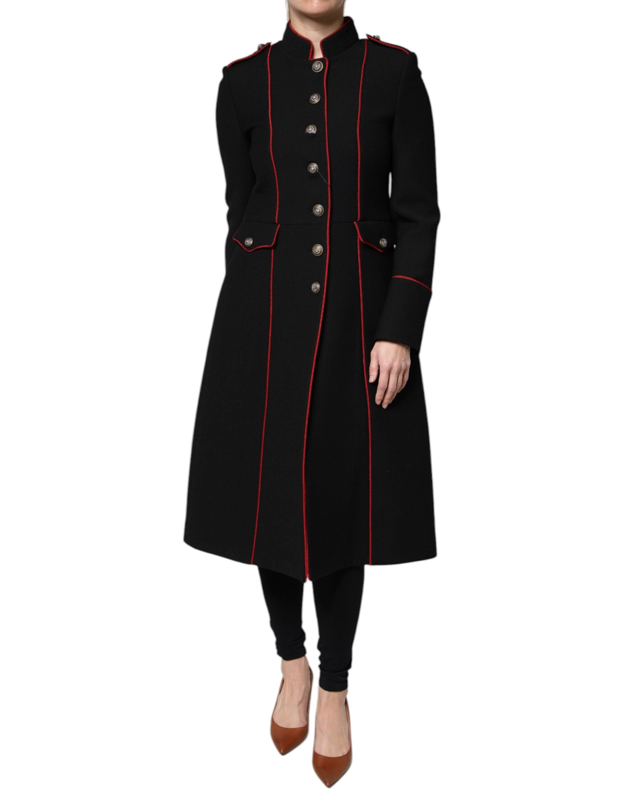 Indulge in the exquisite Dolce & Gabbana Black Single Breasted Trench Coat, a masterpiece of virgin wool and silk that embodies timeless elegance and sophisticated allure.