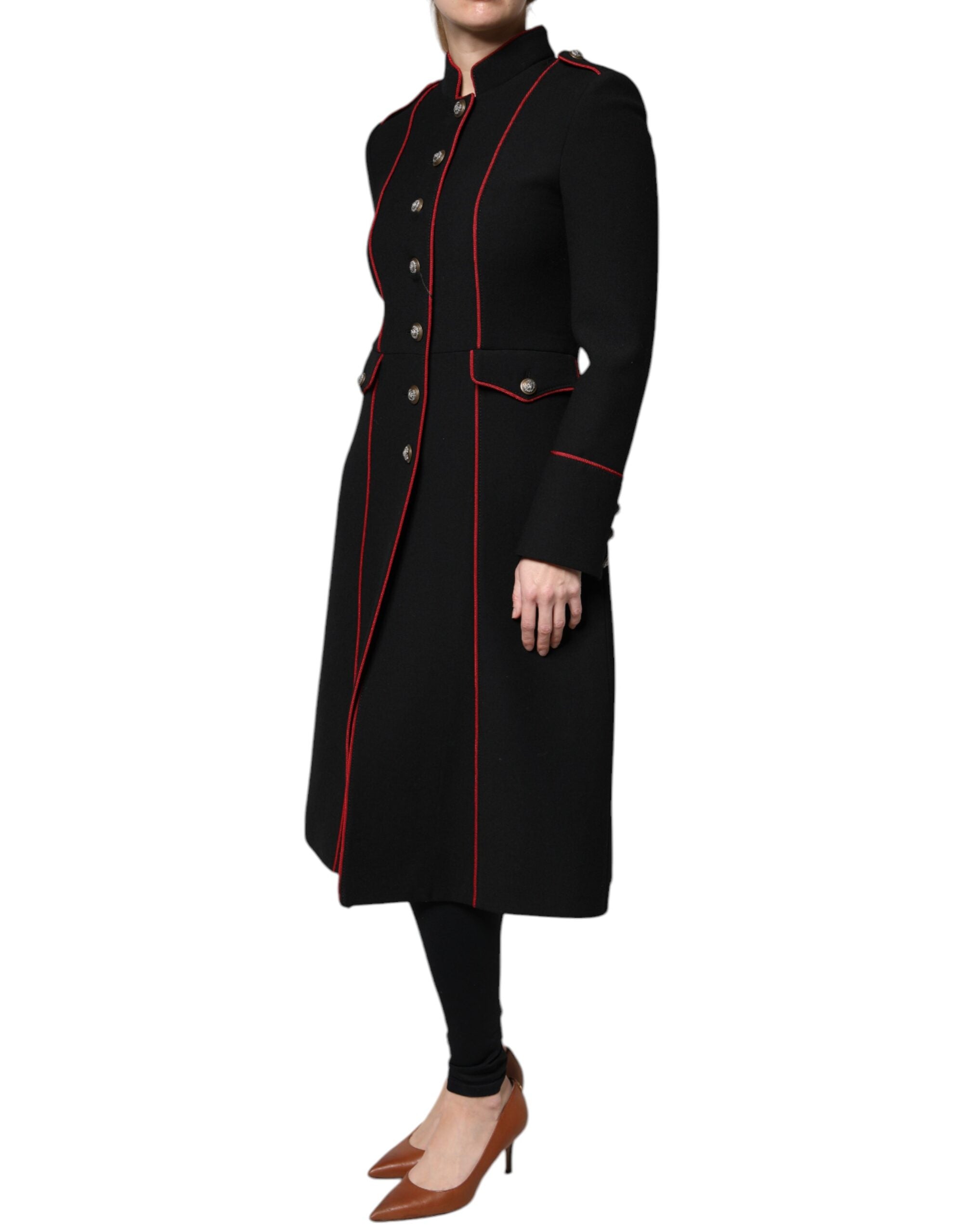 Elevate your wardrobe with the Dolce & Gabbana Black Single Breasted Trench Coat, a masterpiece of virgin wool and silk, embodying timeless elegance and sophisticated allure.