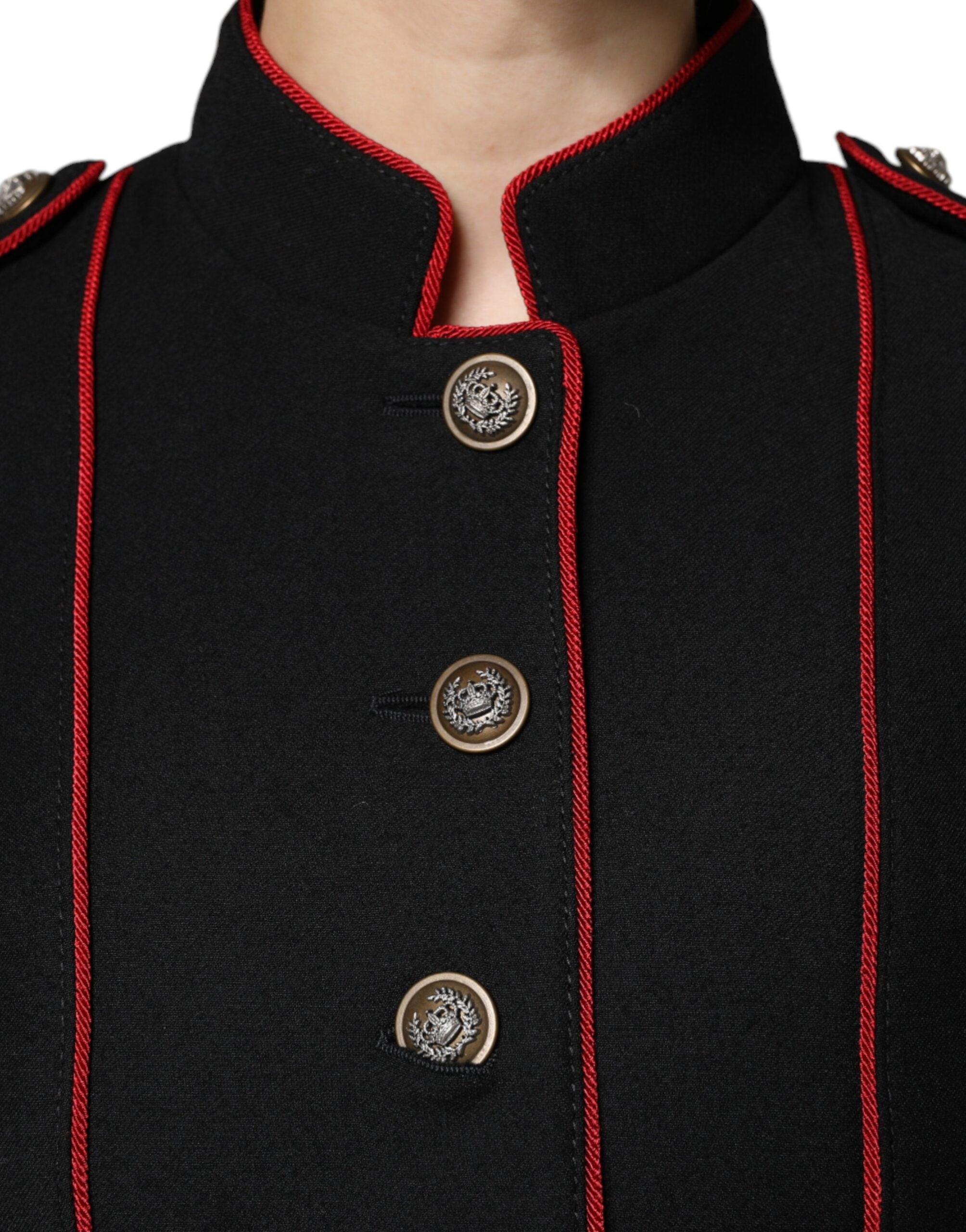 Elevate your wardrobe with the Dolce & Gabbana Black Single Breasted Trench Coat, a masterpiece of virgin wool and silk that embodies timeless elegance and sophisticated allure.