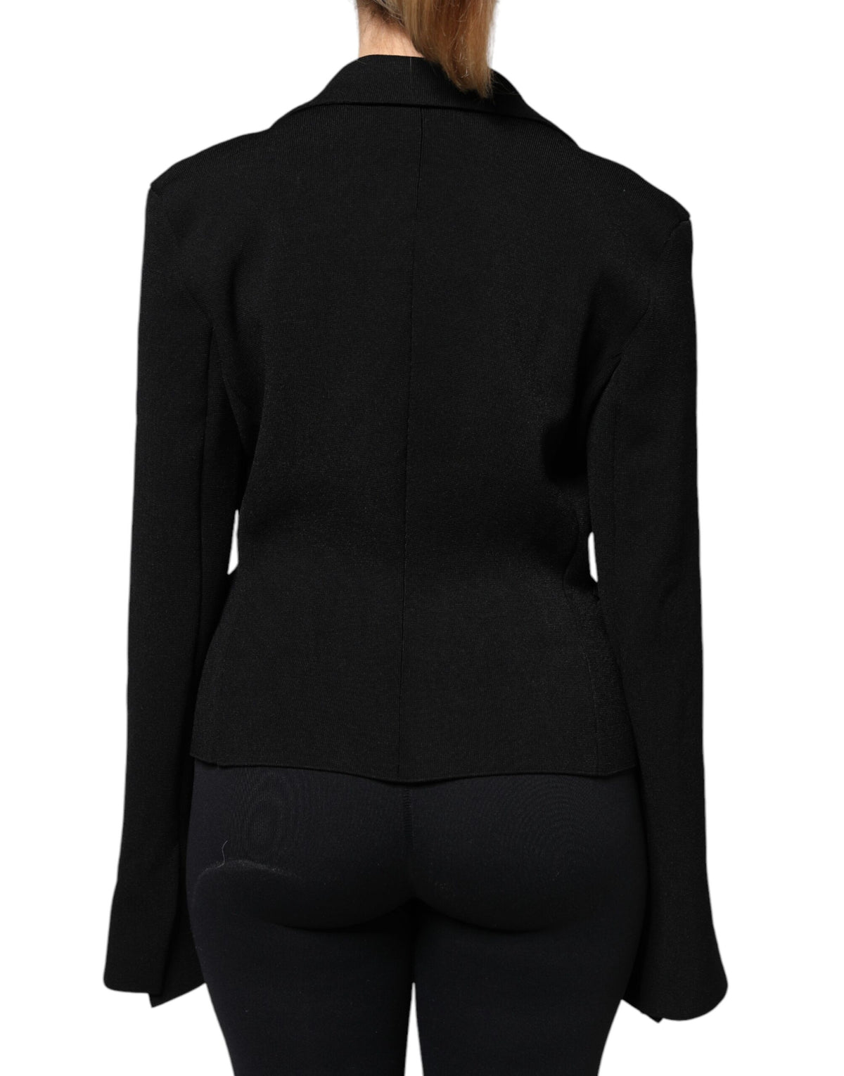 Discover the Dolce & Gabbana Black Viscose Single Breasted Blazer Jacket, a masterpiece of Italian craftsmanship, blending luxurious materials with timeless elegance for the discerning individual.