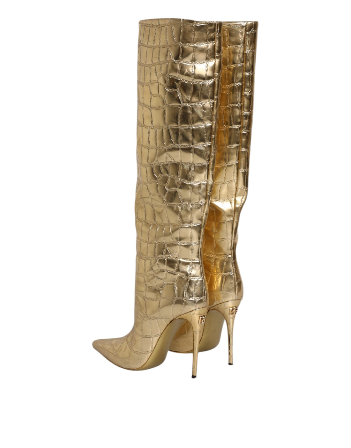 Experience the exquisite allure of Dolce & Gabbana Gold Leather Stiletto Heels, a statement of luxury and sophistication, crafted for the discerning individual.