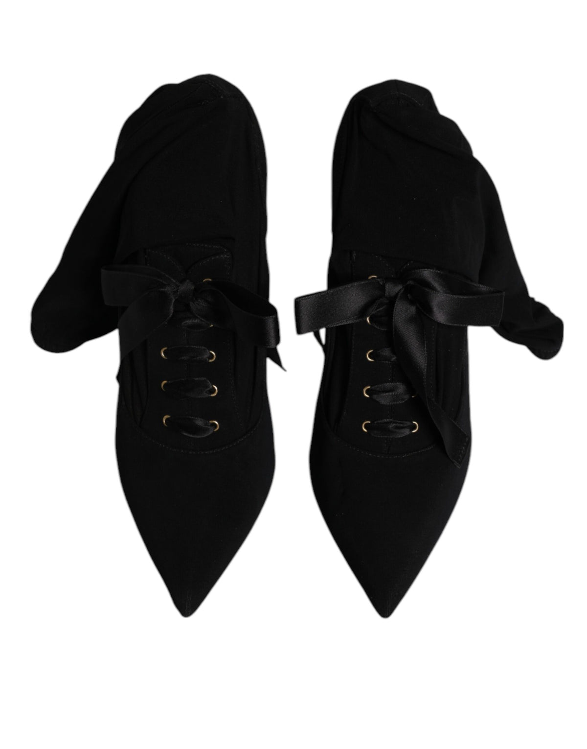 Step into a realm of elegance with Dolce & Gabbana's Black Stiletto Heels Mid Calf Boots, crafted from sumptuous lambskin leather, embodying luxury and sophistication for the discerning individual.