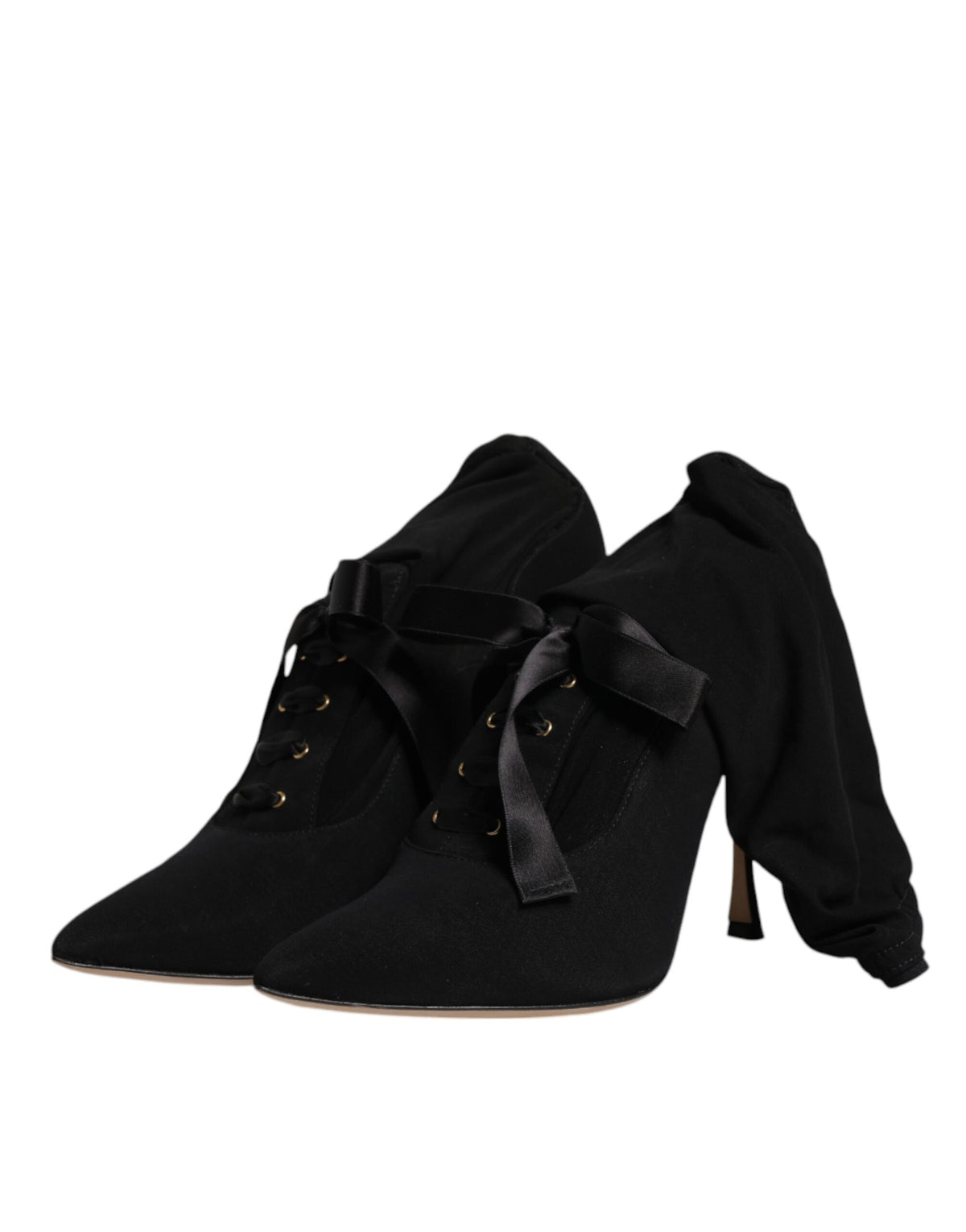 Indulge in the exquisite Dolce & Gabbana Black Stiletto Heels Mid Calf Boots, crafted from luxurious lambskin leather, embodying elegance and sensuality for the discerning fashion aficionado.