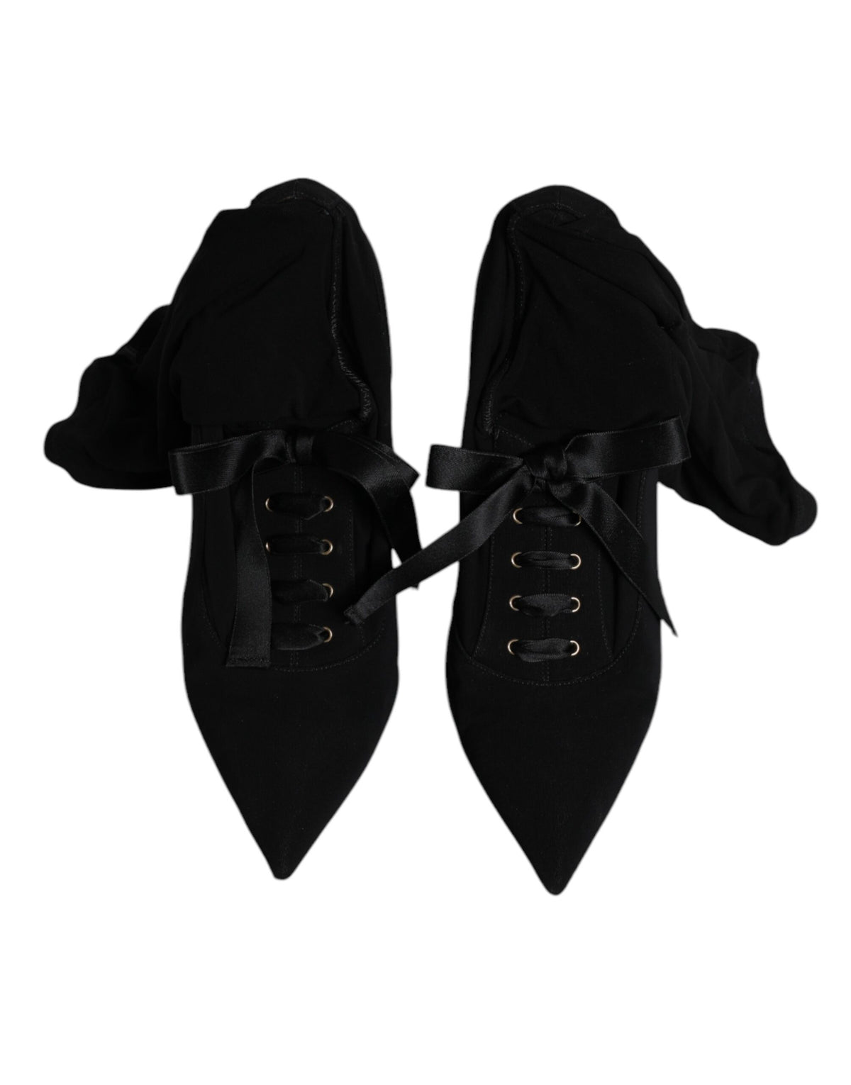 Indulge in the exquisite craftsmanship of Dolce & Gabbana's Black Stiletto Heels Mid Calf Boots, where luxurious lambskin leather meets timeless elegance for the empowered individual.