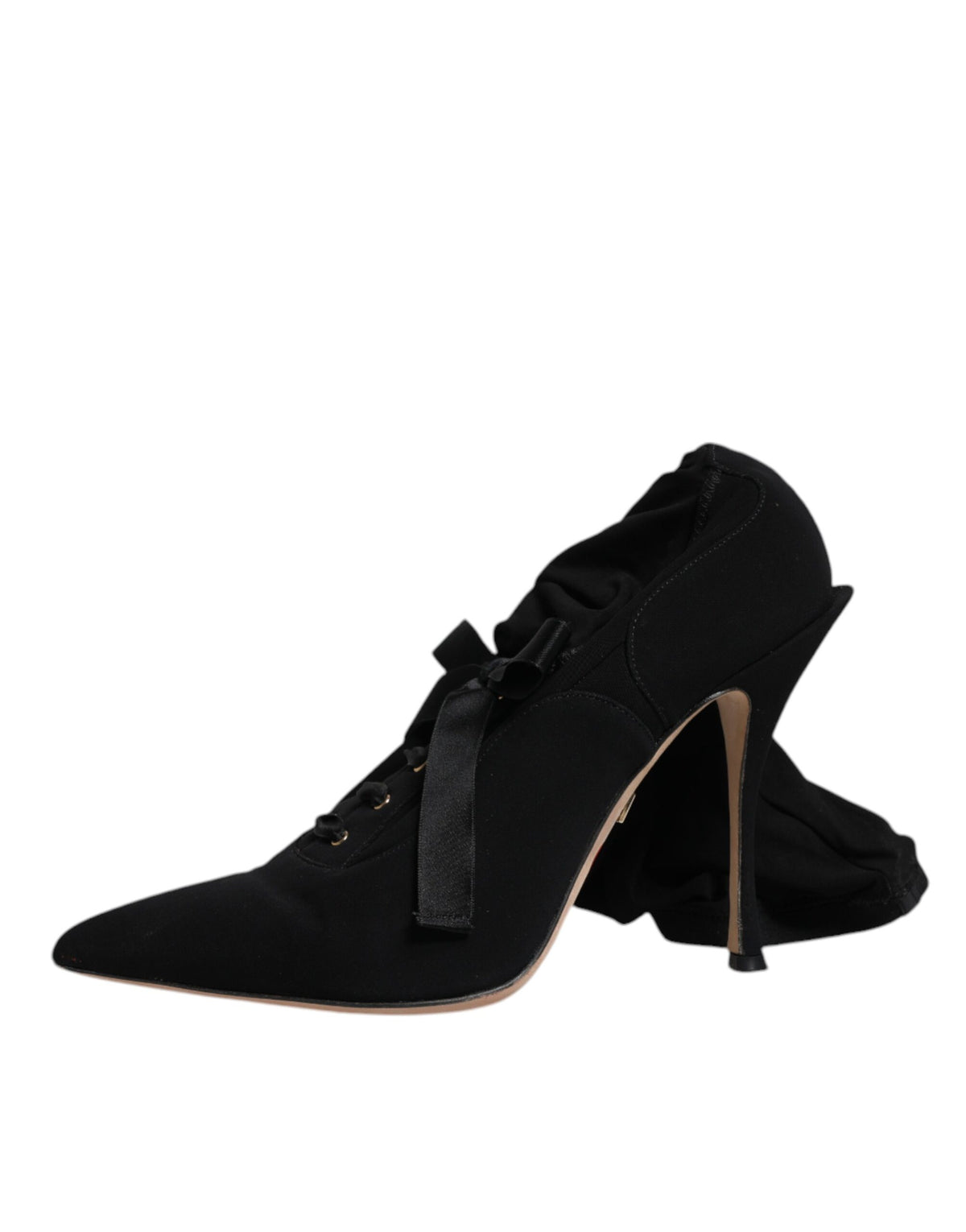 Indulge in the exquisite craftsmanship of Dolce & Gabbana's Black Stiletto Heels Mid Calf Boots, where luxurious lambskin leather meets timeless elegance for the empowered individual.