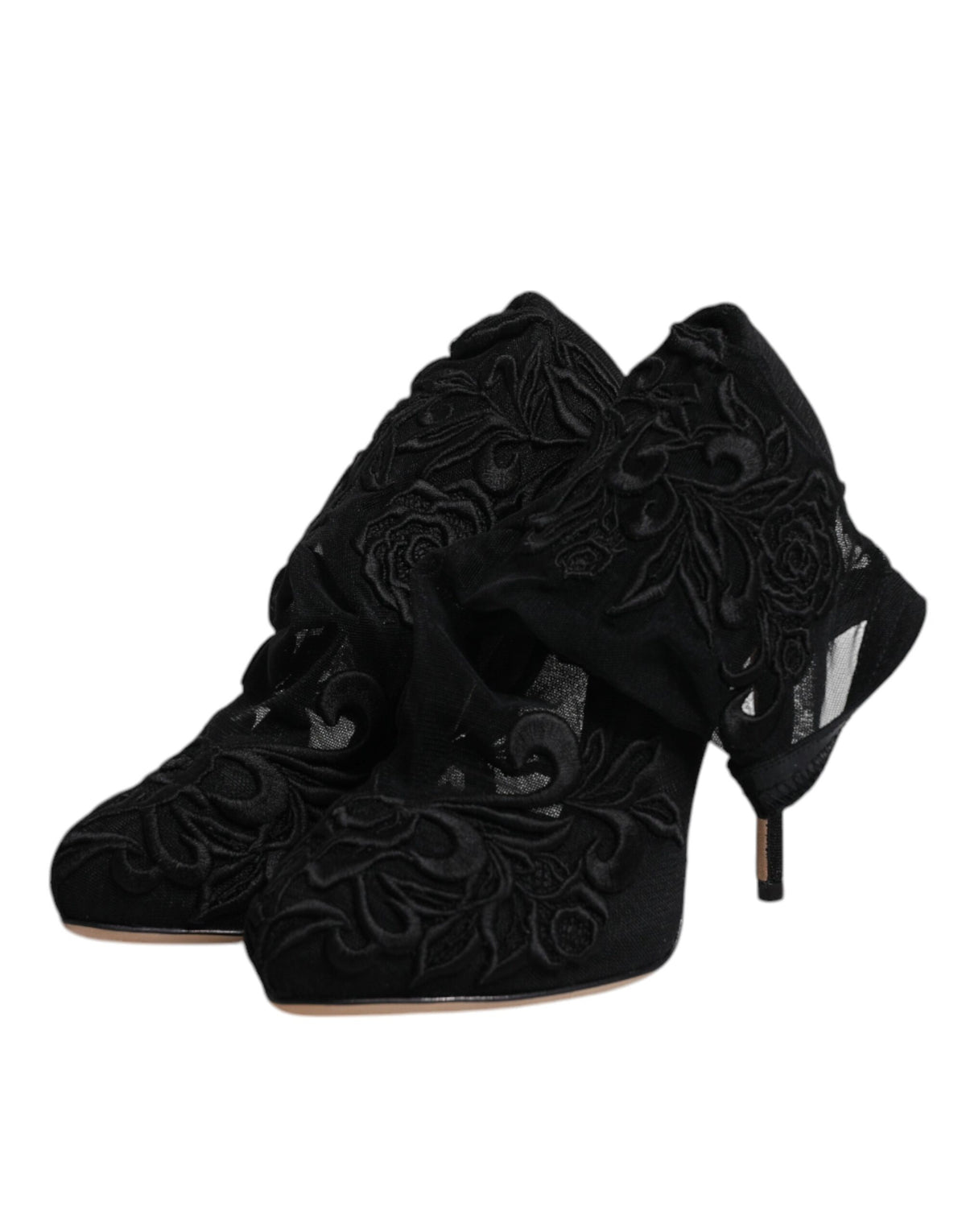 Step into a realm of elegance with Dolce & Gabbana's Black Tulle Stretch Heels, crafted in Italy from premium nylon, embodying luxury and sophistication for every occasion.