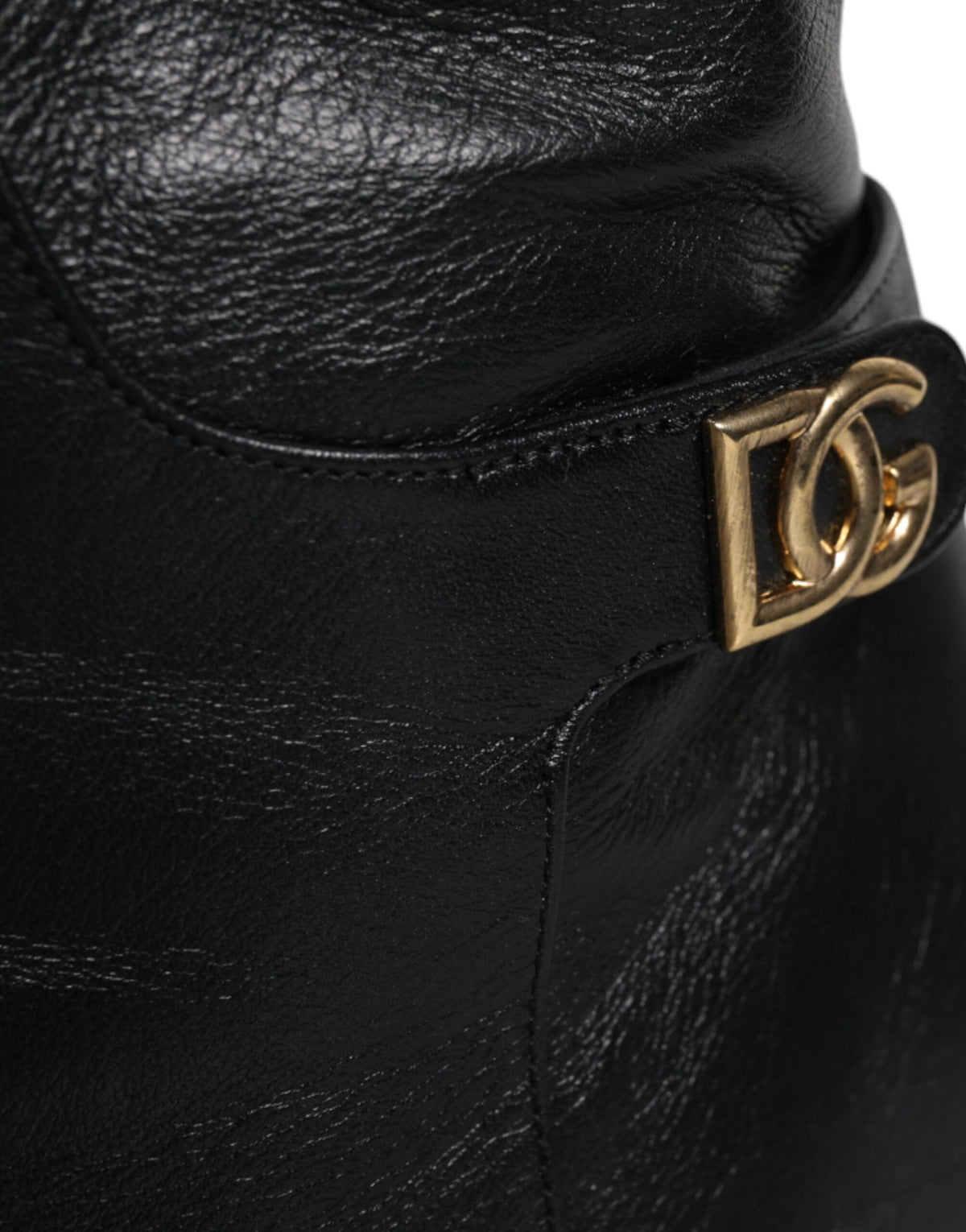 Elevate your wardrobe with Dolce & Gabbana's Black Leather Heels Knee High Boots, a symbol of Italian craftsmanship and timeless elegance for the discerning individual.