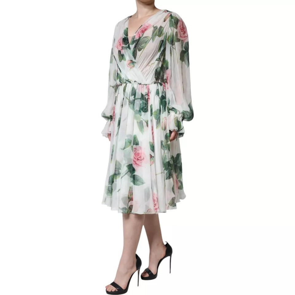 Indulge in the exquisite Dolce & Gabbana White Silk Floral Print A-line Midi Dress, a luxurious blend of silk and romance, crafted in Italy for the discerning individual.