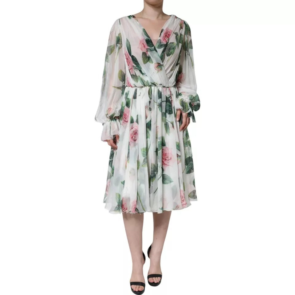 Elevate your wardrobe with the Dolce & Gabbana White Silk Floral Print A-line Midi Dress, a masterpiece of Italian craftsmanship that embodies timeless elegance and romantic allure.