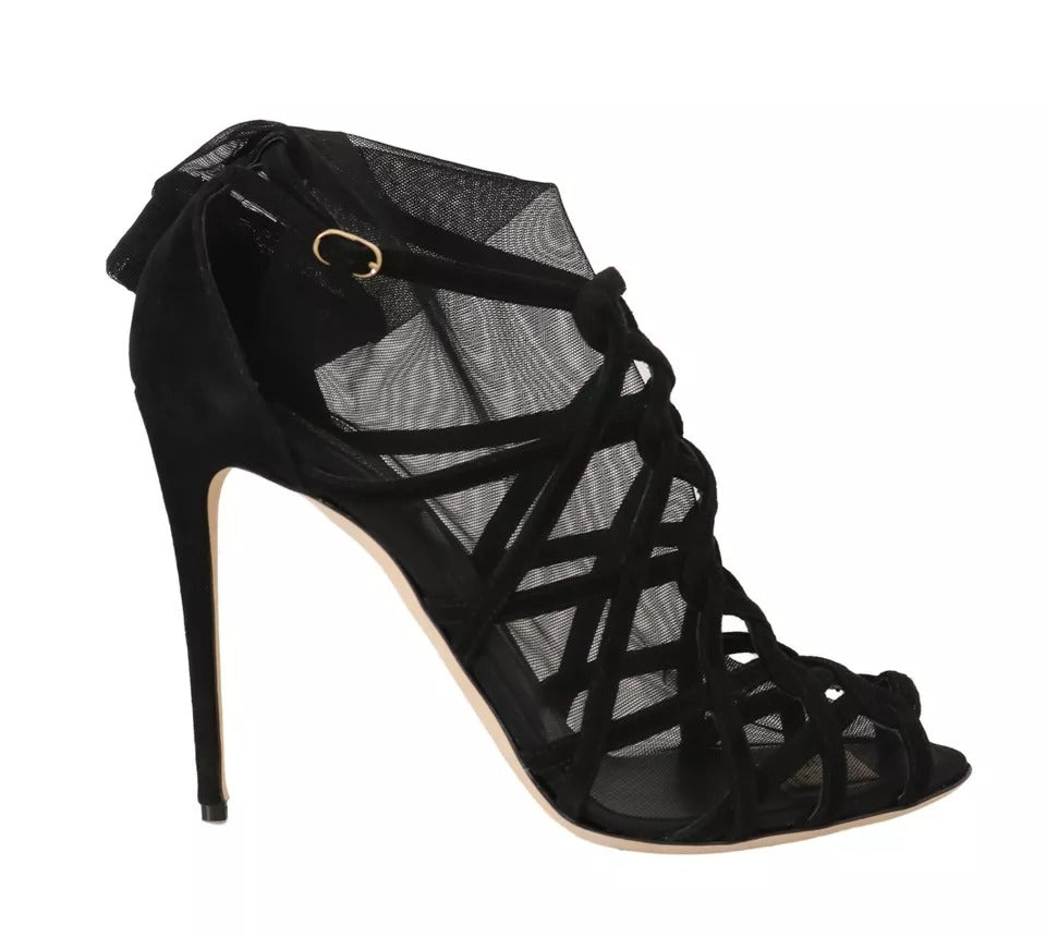 Experience the allure of Dolce & Gabbana Black Suede Stilettos Booties, where luxurious suede and Italian craftsmanship create an exquisite statement of sophistication.