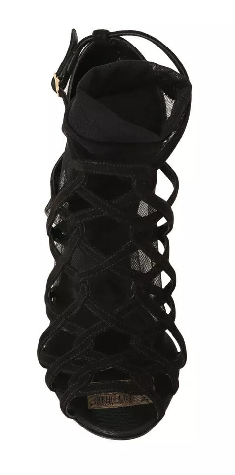 Step into the realm of luxury with Dolce & Gabbana Black Suede Stilettos, where exquisite craftsmanship meets timeless elegance, perfect for the discerning individual.