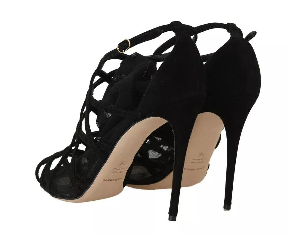 Elevate your wardrobe with Dolce & Gabbana Black Suede Stilettos Booties, where exquisite craftsmanship meets timeless elegance, perfect for the discerning connoisseur.