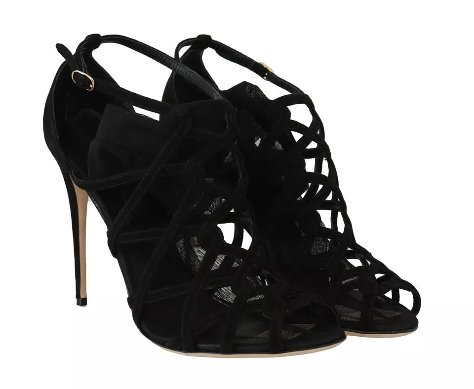 Elevate your style with Dolce & Gabbana Black Suede Stilettos Booties, where luxurious suede meets exquisite Italian craftsmanship for a timeless statement of sophistication.