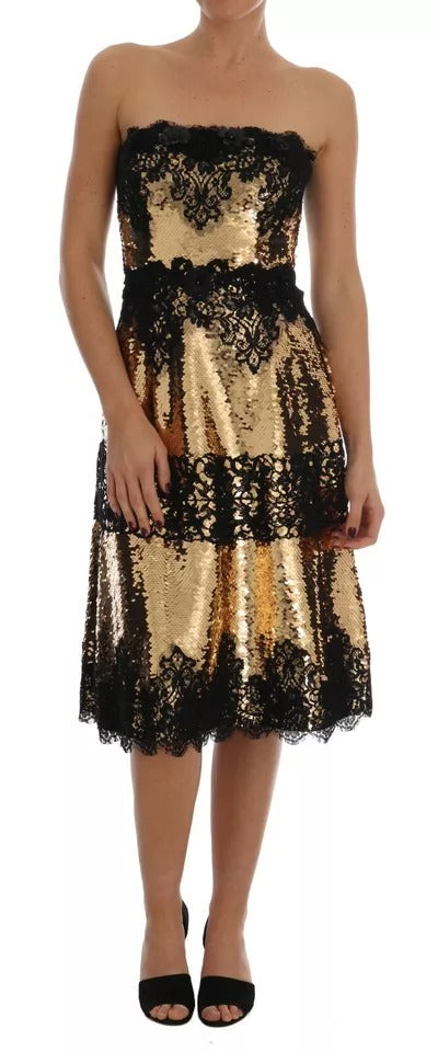 Experience the allure of Dolce & Gabbana's Gold Strapless Sequin Embellished Lace Dress, a masterpiece of haute couture crafted from luxurious materials for unforgettable elegance.