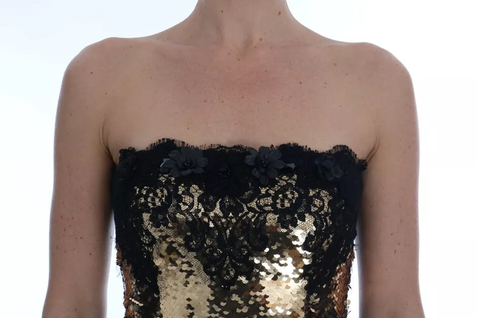 Indulge in the exquisite allure of the Dolce & Gabbana Gold Strapless Sequin Embellished Lace Dress, a masterpiece of luxurious craftsmanship and timeless elegance, perfect for unforgettable moments.