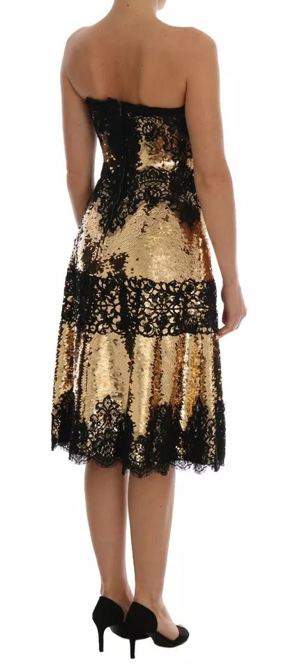 Experience the allure of Dolce & Gabbana's Gold Strapless Sequin Embellished Lace Dress, a masterpiece of haute couture that embodies elegance and sophistication.