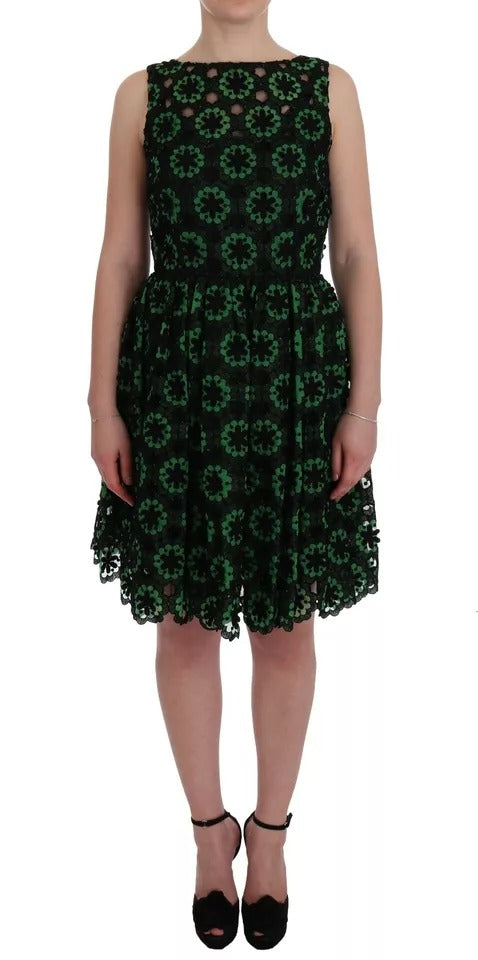 Discover the Dolce & Gabbana Green Floral Ricamo A-Line Shift Dress, a luxurious blend of silk and cotton, crafted in Italy for timeless elegance and effortless allure.